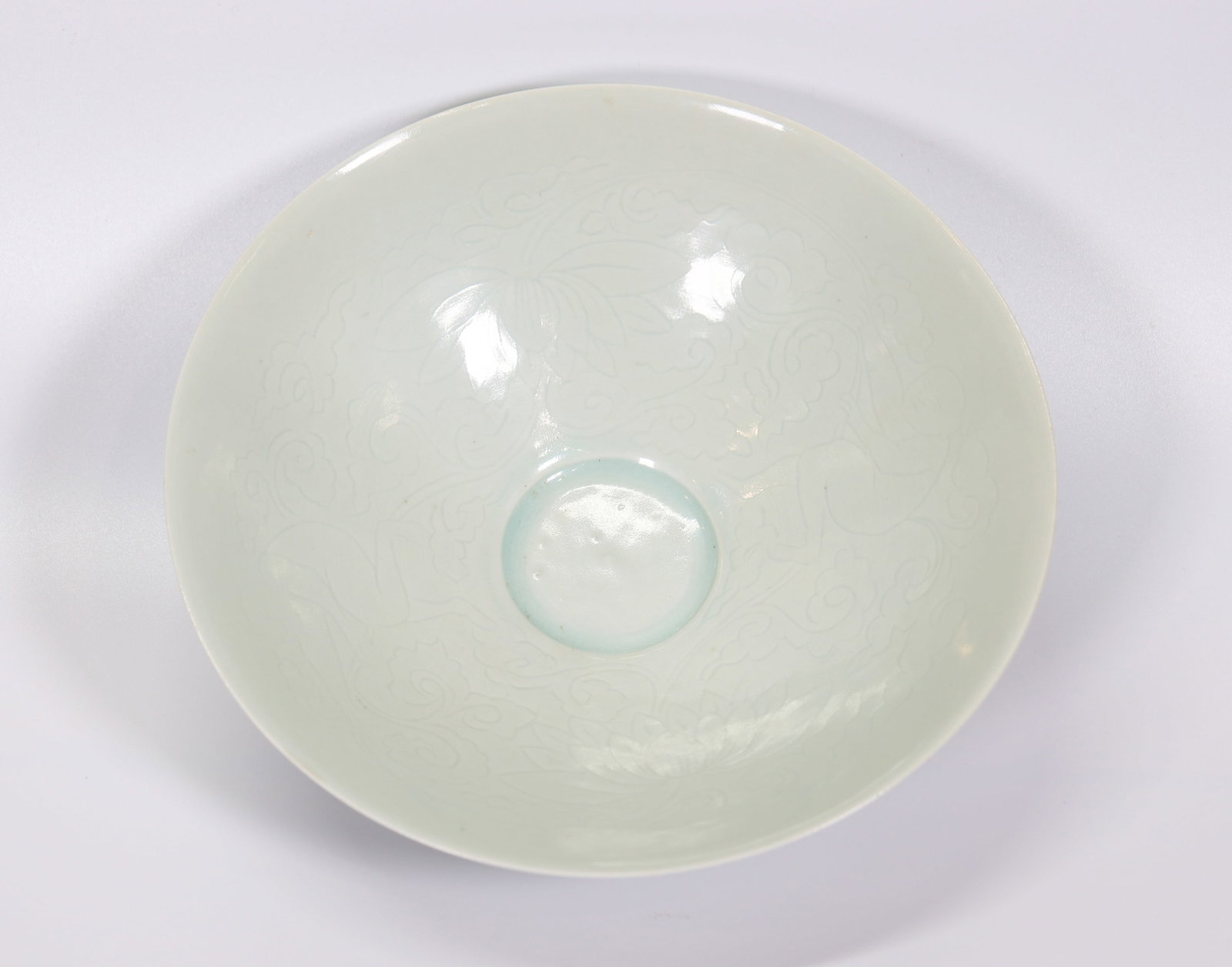 Chinese Qingbai Porcelain Large Bowl: Chinese Song-type Qingbai (Yingqing) glazed Porcelain "Boy & Lotus" incised Large Bowl. Diameter 8 1/4 inches (21 cm.). PROVENANCE: Purchased from Warren E Cox, East 39th Street, New York, NY circa 19
