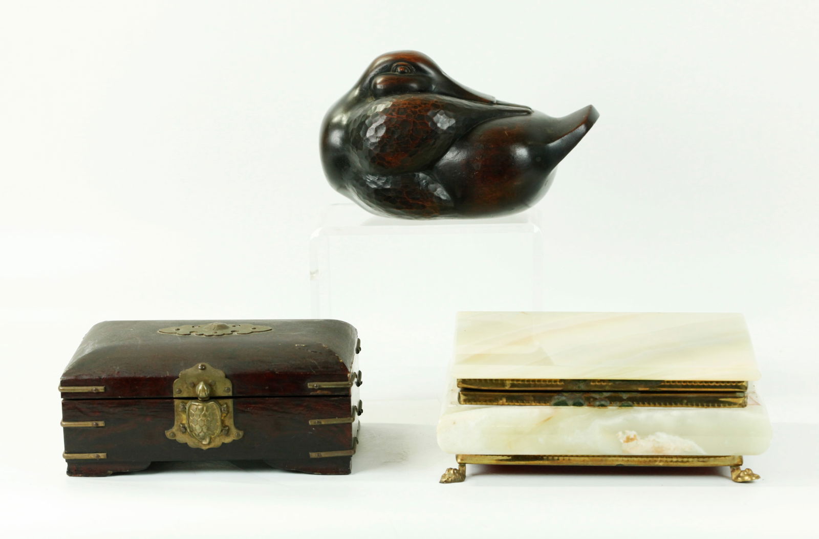Robert Russin Wood Duck Onyx Jewel Box Korean Box: Attributed to Robert Isaiah Russin (NY, 1914- LA, 2007); a carved Wood Duck.with impressed marks to base spelling out "RUSSIN;" together with a light green Onyx hinged rectangular Jewel Box on 4 brass