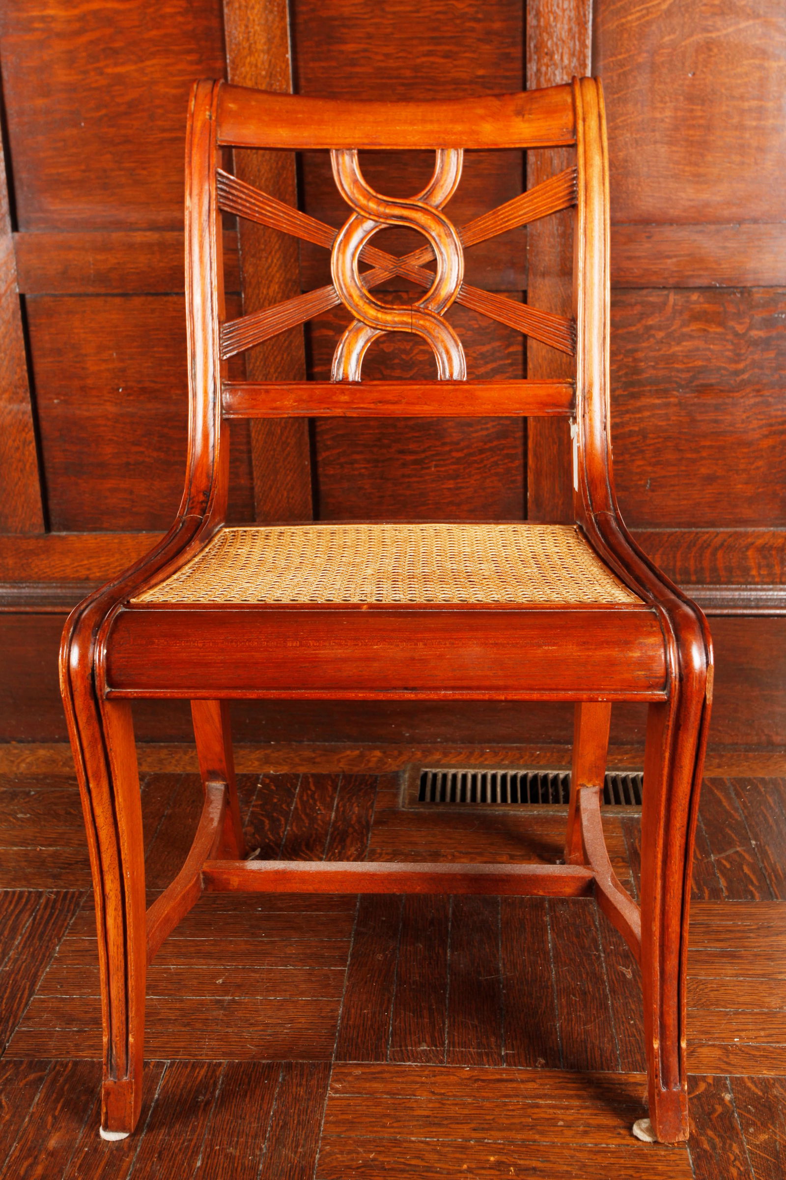 Duncan Phyfe Style Mahogany Side Chair Cane Seat: Duncan Phyfe Style Mahogany Side Chair Cane Seat. Height to back of chair 34 inches ( 86.3cm.) X width of seat 19 inches ( 48.2 cm.). PROVENANCE: Fine furnishings from an Historic 19th Century Lawrenc