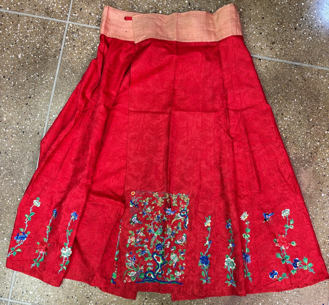 Chinese Qing Dynasty Embroidered Damask Silk skirt: Chinese Red Damask Pleated Skirt Embroidered with birds, butterfly and flowers. Height 35 inches (89 cm.).