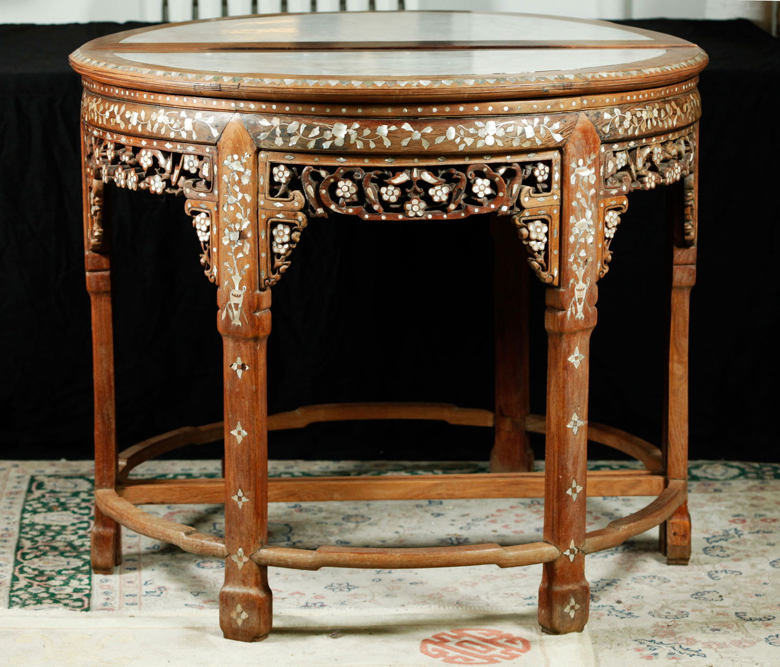 Pr Chinese Wood Shell & Marble Demi-Lune Tables: Fine Pair Chinese Yellow Hard Wood Demi-Lune Tables, each with 2 full legs and 2 half legs forming 6 legs when joined as a circular table, with carved floral skirt & brackets under a waisted top and r