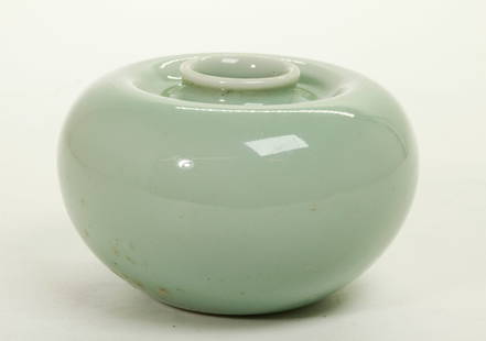 Chinese Pale Celadon Porcelain Water Coup: Chinese Pale Celadon Porcelain Scholar's Water Coup, the recessed base in clear glaze with 6 character horizontal Kangxi mark in underglaze blue. Height 2 1/2 inches (6.3 cm.).