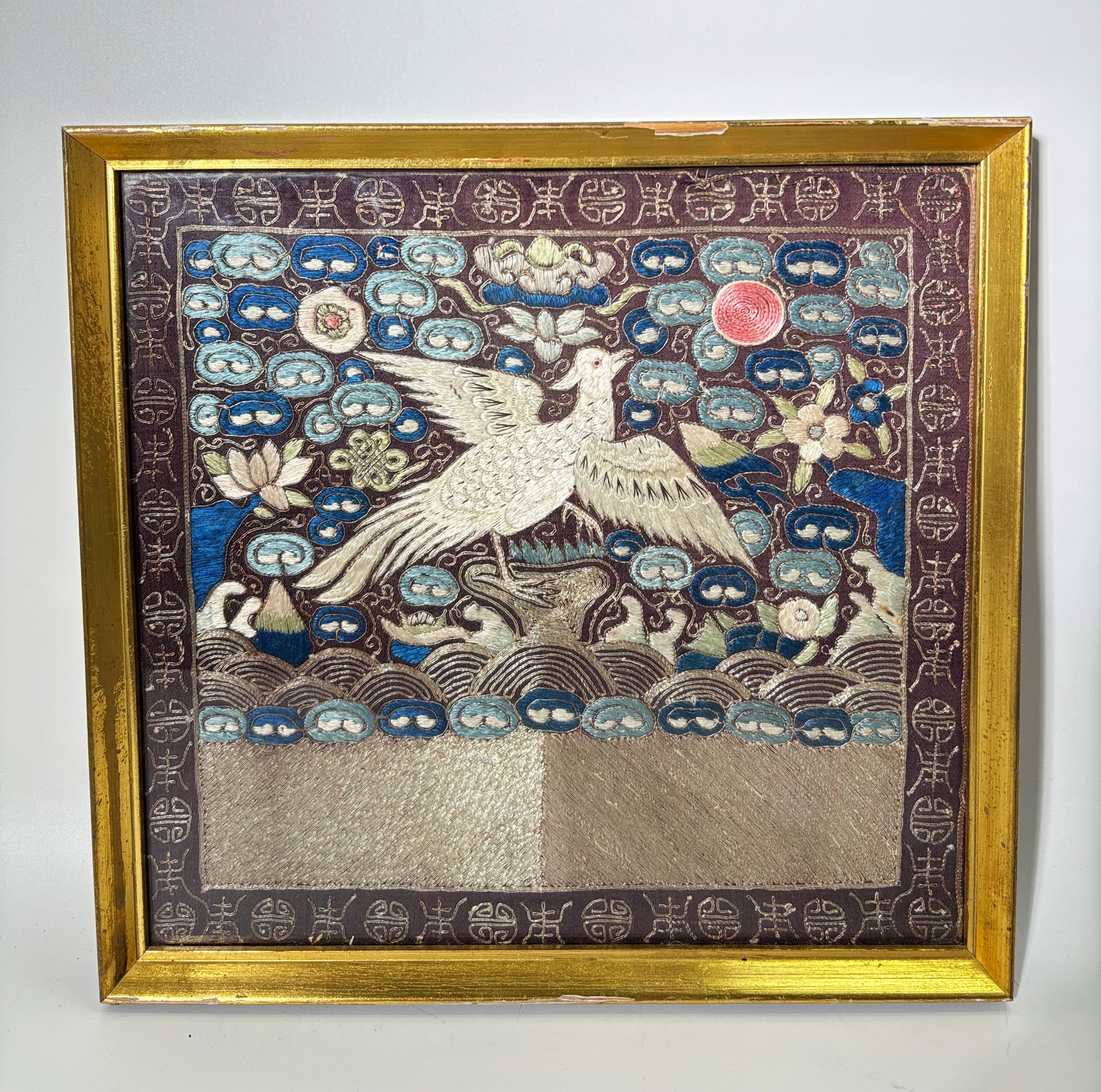 Chinese Qing Court Embroidered Civil Rank Badge: Chinese Qing Dynasty Court Embroidered Civil Rank Badge for the back without seam and of a white bird in clouds and waves in silk floss all highlighted with laid silver wrapped thread details, highlig