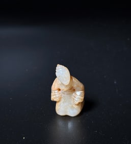 Chinese Archaistic White Jade Supplicant Toggle