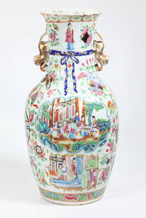 Chinese 19 C Rose Mandarin "Fabric" Porcelain Vase: Chinese 19 Century Rose Mandarin "Folded Fabric" Shaped Porcelain Vase with a bow at the neck and Gilt Fu Dog & Red Ball Handles to the neck, the sides with "windows" of Court Figures in Gardens & Pav