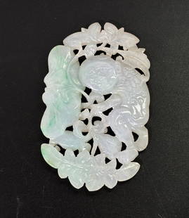 Chinese Qing Translucent Jadeite Lotus Boy Pendant: Good Chinese Qing Dynasty Pendant in fine translucent warm white Jadeite with slight apple green inclusion, carved, pierced and polished as scrolling Lotus and a Baby Boy wrapped in Lotus design cloth