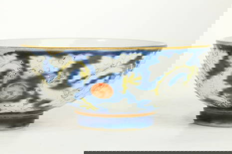 Fine Chinese Daoguang Enamel Porcelain Dragon Bowl: Fine Chinese Daoguang Enamel Porcelain Bowl with 2 5-claw Dragons with white enamel bodies incised with scales, in clouds on a blue ground and 2 flaming Pearls in iron red, the base with a 4 character