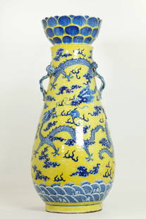 Fine Lg Chinese Blue White Porcelain Dragon Vase: Fine Large Chinese Blue White Porcelain Vase with pairs of 4-Claw Dragons in clouds & flanes with a Flaming Pearl to each side all on a yellow enamel ground over blue waves. the mouth shaped as a blue