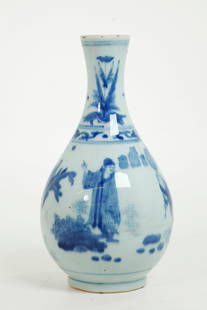 Chinese Blue & White Porcelain Bottle Vase: Chinese Blue & White Porcelain Bottle Vase with a design of a Scholar standing in a Garden with Assistant with large fan, the recessed base in clear glaze. Height 8 1/2 inches (21 cm.).