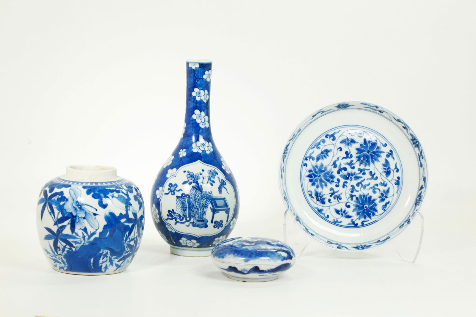 4 Good Chinese 19th C Blue & White Porcelains: 4 Good Chinese 19th Century Blue & White Porcelains: a bottle Vase with 2 shaped "windows" of flowers & antiques on a ground of white prunus blossoms floating on blue cracked ice with double ring mark