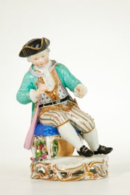 Meissen Porcelain Seated Boy with Flowers