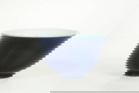 Chinese Blue Glazed Monochrome Porcelain Bowl: Chinese Blue Glazed Monochrome Porcelain Bowl; the inside and base in clear glaze with 6 character Yongzheng mark inside double rings in blue to base. Diameter 4 3/8 inches (11 cm.).