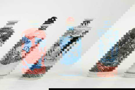 3 Chinese Blue & Red Porcelain Tube Snuff Bottles: 3 Chinese Blue & Red Porcelain Tube Snuff Bottles: 1 with figures on Boats on red waves and on Land with 4 character Yongzheng mark to base, 1 with Mythological Animals on red waves with 4 character Y