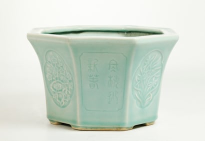 Chinese 8 Panel Celadon Planter & Molded Designs