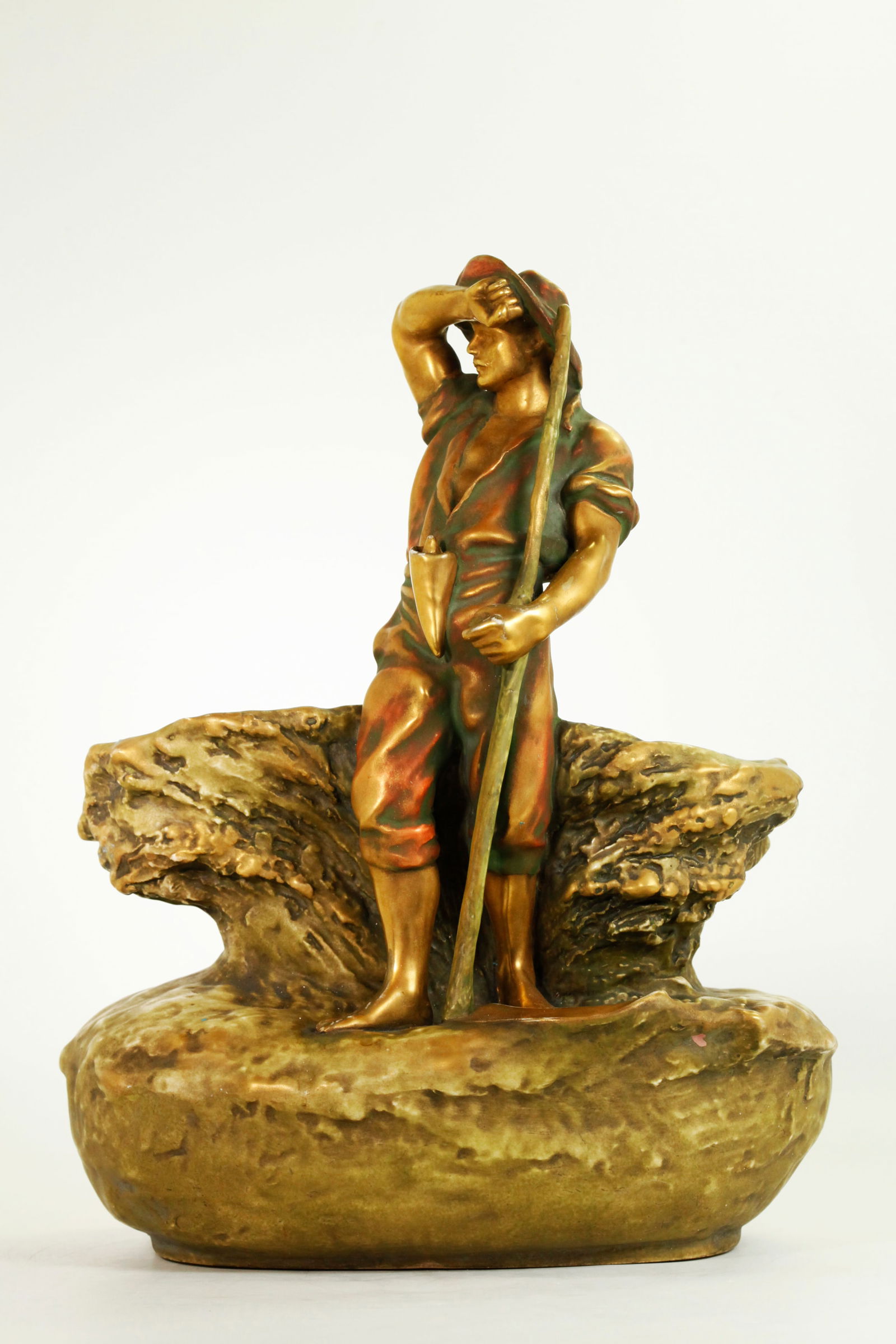 Amphora Austrian Glazed Pottery "Farmer" Planter: Amphora Ware, Austria circa 1900; Gilt & Glazed Art Nouveau Pottery Planter shaped as an abstract Wheat Harvest in green enamels with standing Farmer with Sickle in toned gilding; after the Barbazon "