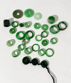 7 Chinese Jadeite Finger Rings; 23 Small Rings