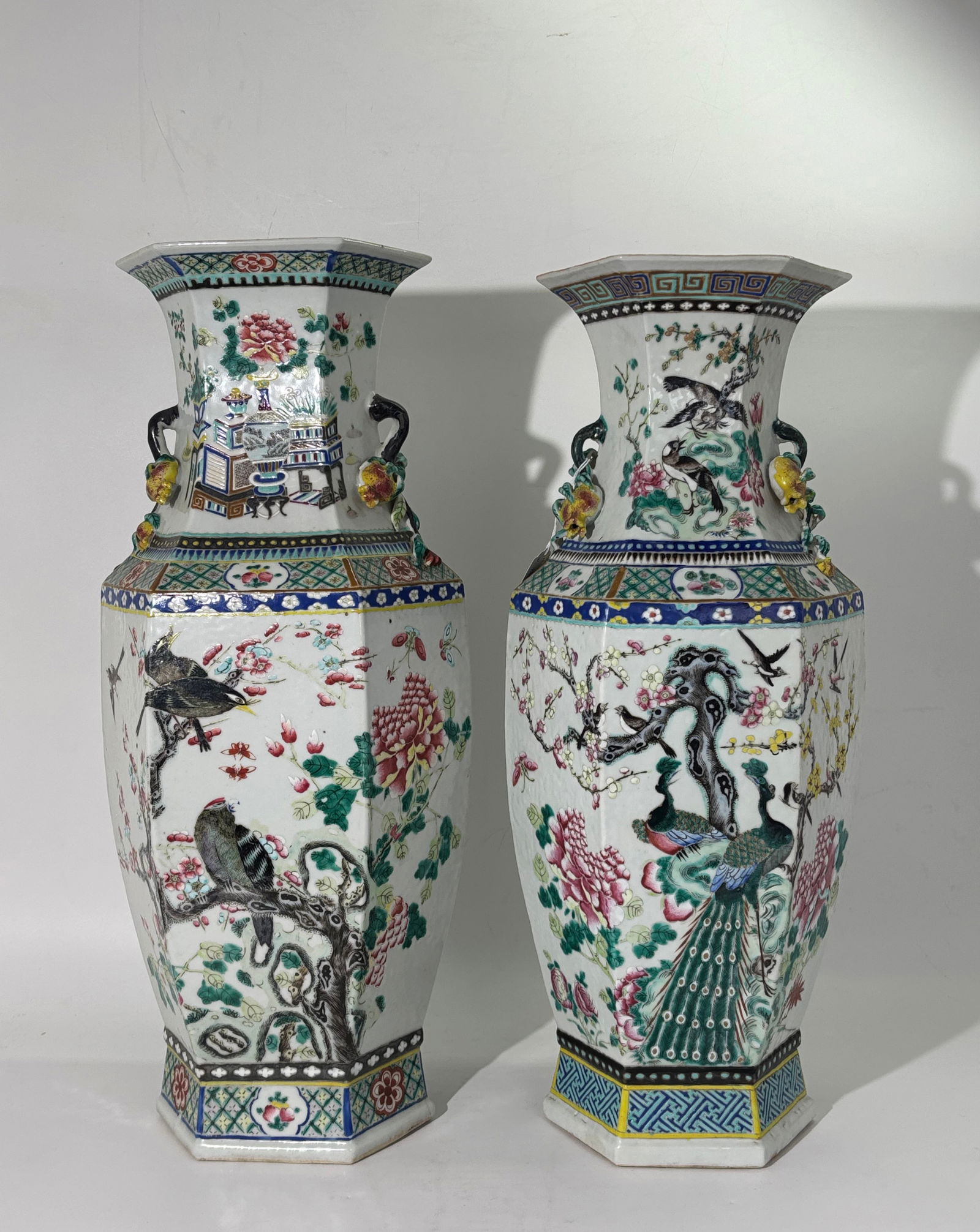 Lg Near-Pair Chinese Enameled Porcelain Vases: Large Near-Pair Chinese Enameled Porcelain Vases, the hexagonal sides well painted with Birds & Flowers to one side and the reverse of each with Antiques, Flowers and Scholarly Objects all between col