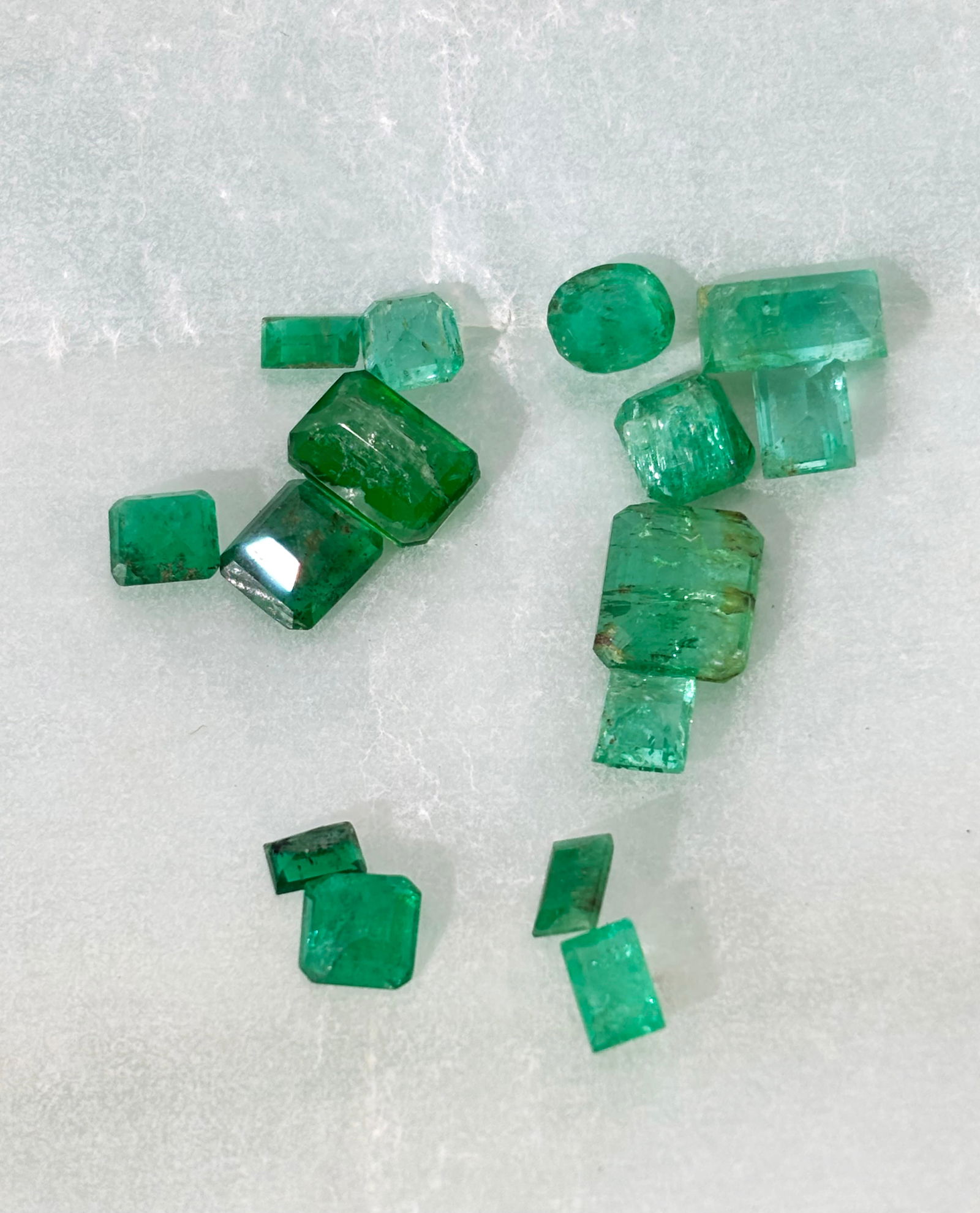 15 Small Faceted Emeralds; 1 Larger Pear Shape (1 of 4)