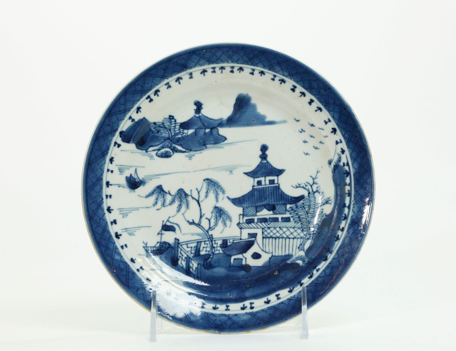 Chinese 19 C Blue White Canton Porcelain Plate: Chinese 19th Century Blue & White Canton Pattern (Nanking Pattern) Porcelain small Plate with traces of gilding to outside edge, the bottom in clear glaze. Diameter 7 1/4 inches X height 7/8 inch.