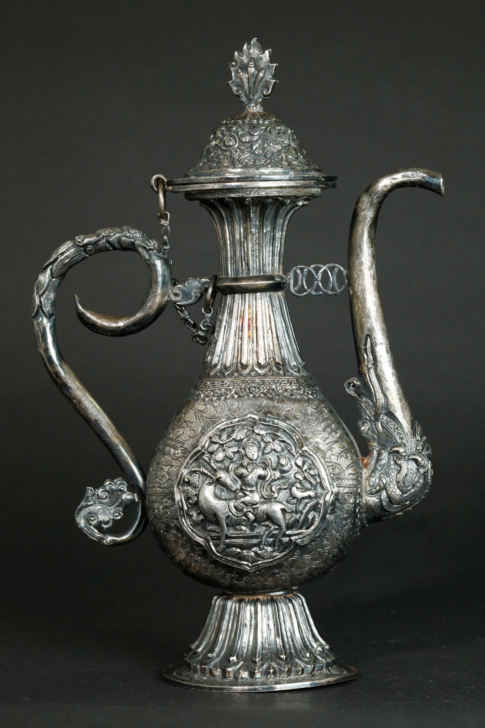 Chinese 18th C Repousse & Incised Silver Wine Pot: Chinese 18th Century or earlier Repousse & Incised Silver Wine Pot with a shaped window to the front with a Monkey riding an Elephant, the reverse with a Bodhisattva riding a Deer, with various Buddhi
