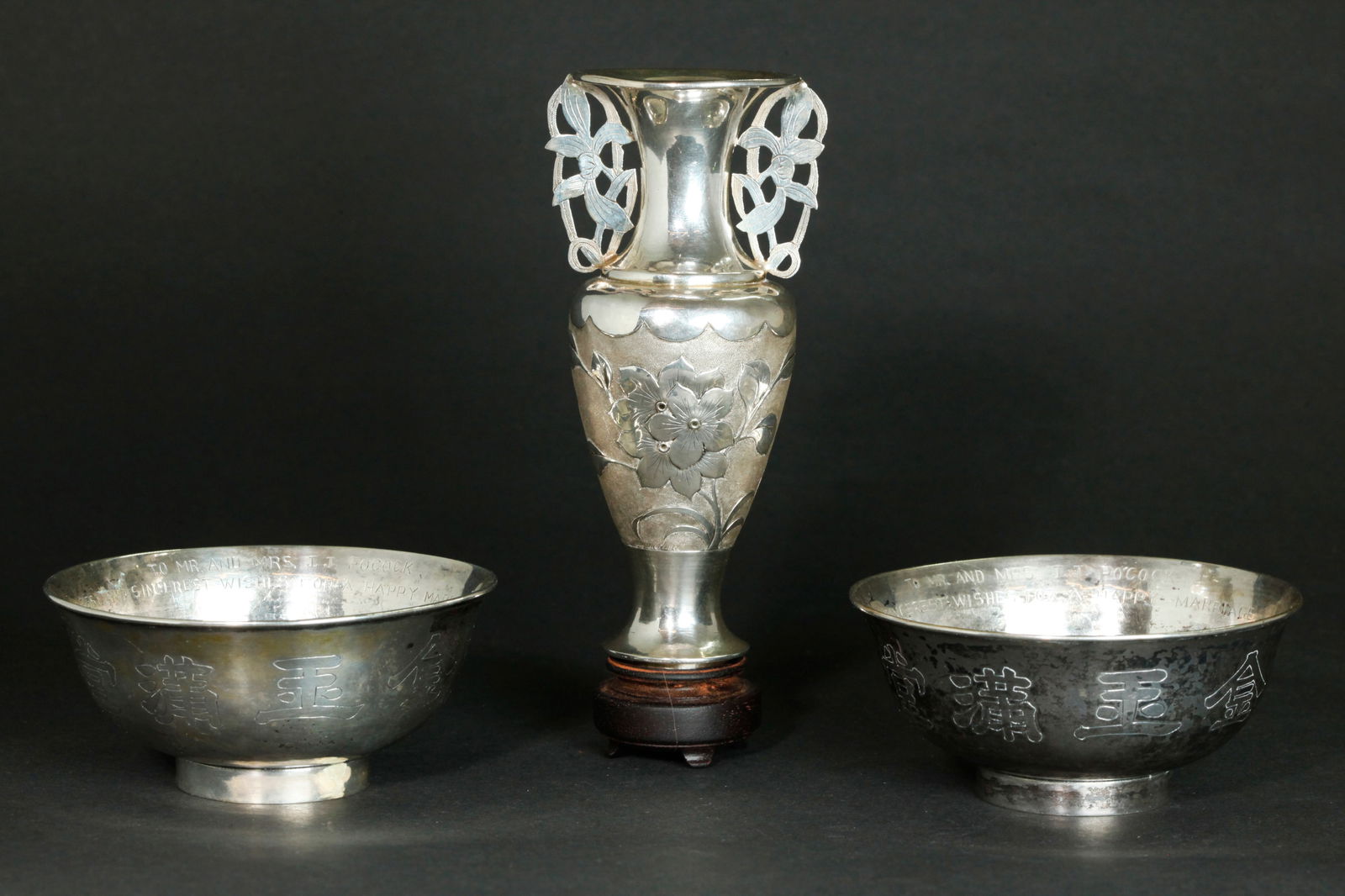 3 Chinese Silver; Pr Qing Yun Bowls & Small Vase: 3 Vintage Chinese Silver pieces; a Pair of Bowls with the outside incised with a Peacock, Peahen and Magnolia branch to one side and outline calligraphy to the reverse, the inside with a medallion of