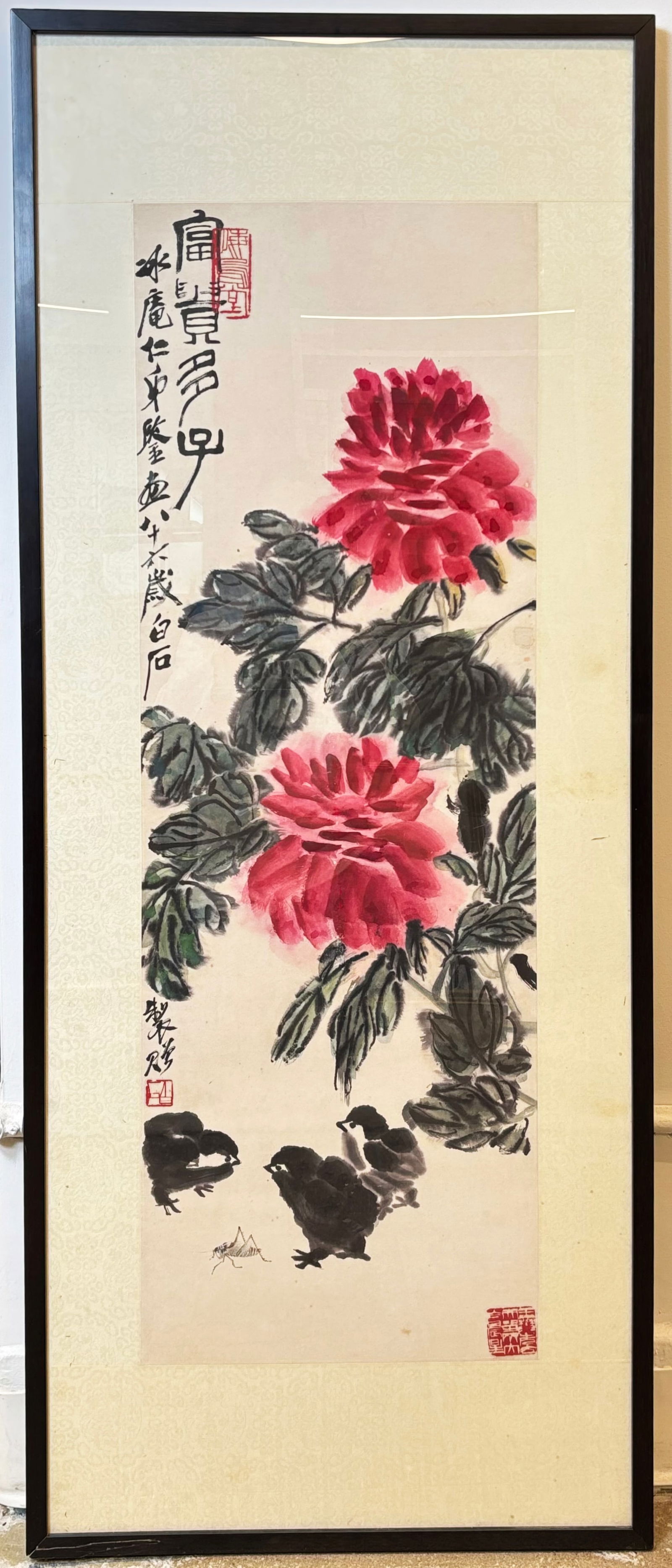 Qi Baishi; Chinese Ink & Color Hanging Scroll: Chinese Ink & Color on Paper Hanging Scroll of 3 chicks & a Grasshopper under peonies, with ink inscriptions and 3 red seals; mounted with silk borders, Framed to edges of borders. Height of art 39 1/