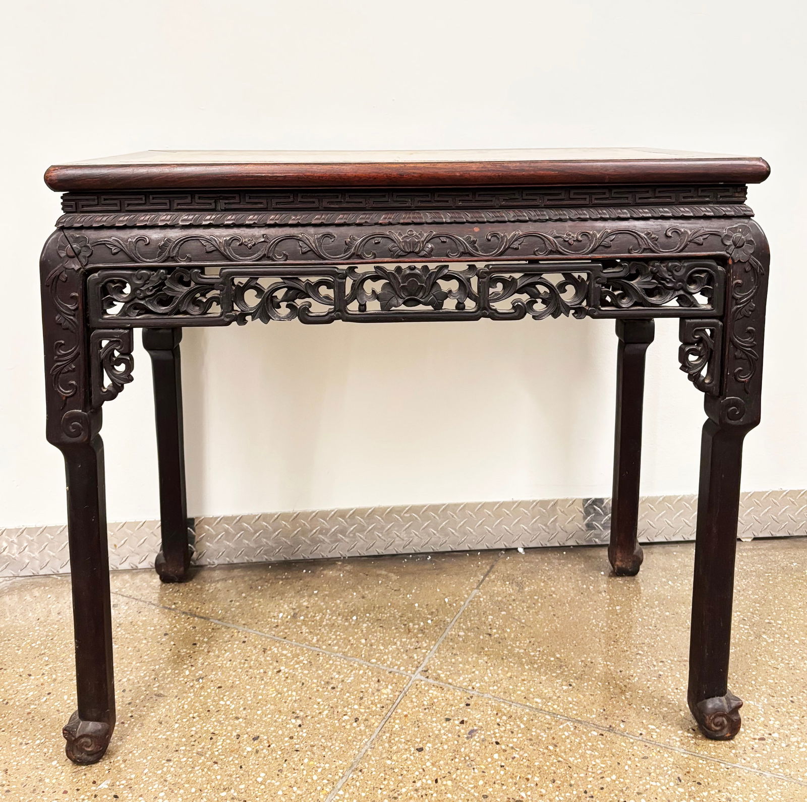 Chinese 19th Cen Waisted Rectangular Wood Table: Chinese 19th Century Waisted Rectangular Table on 4 curled bottom feet, the top with a pink Marble Insert and wide pierced skirts to all 4 sides with brackets. Height 32 1/4 inches X width 35 inches X