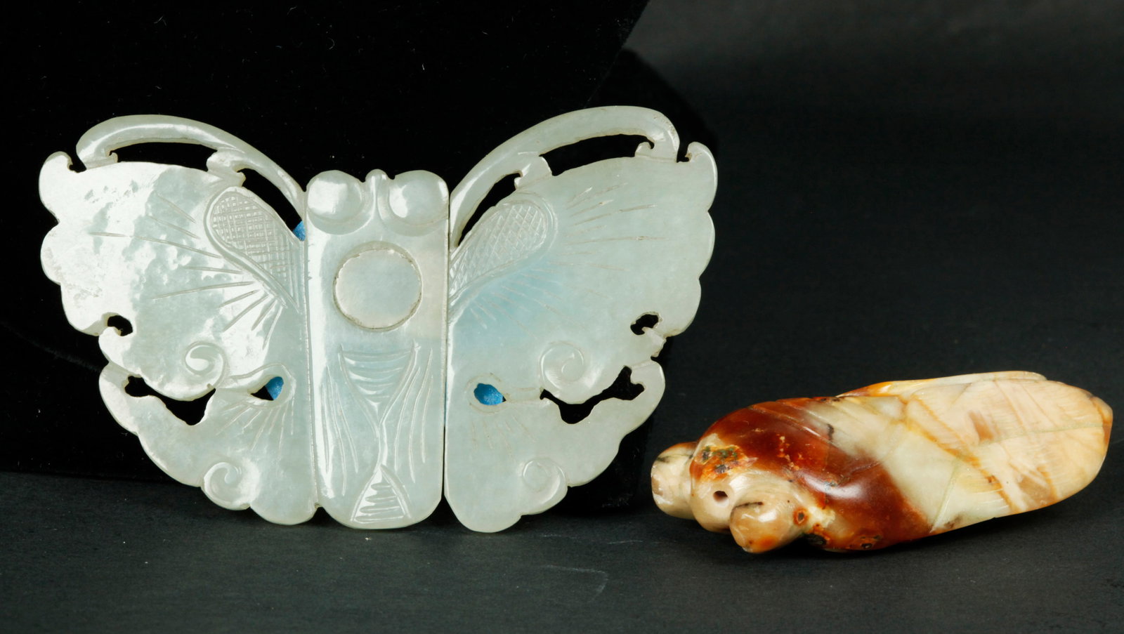 Chinese 18/19C Jade Butterfly Buckle, Agate Cicada: Chinese 18th/19th Century Pale Celadon Jade 2 part Butterfly Buckle with designs to top and polish to back side; together with a Carnelian Agate in cream colored matrix carved as a Cicada with bull-no