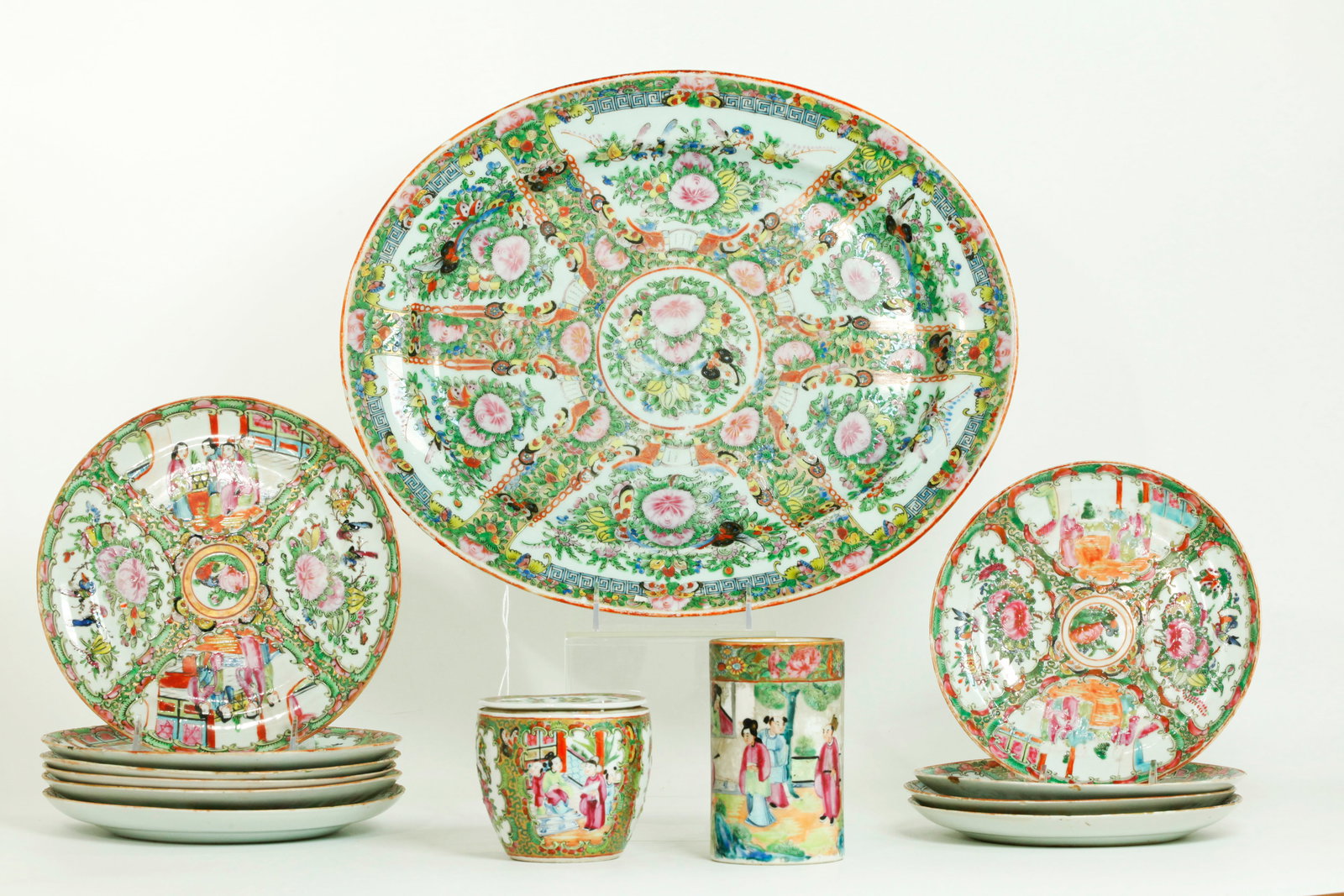 13 Pieces Chinese 19th C Rose Medallion Porcelains: 13 Pieces Chinese 19th and early 20th Century Rose Medallion Porcelains: a large oval serving platter with flat unglazed base, a good Rose Mandarin brush pot with a continuous scene of Court Figures o