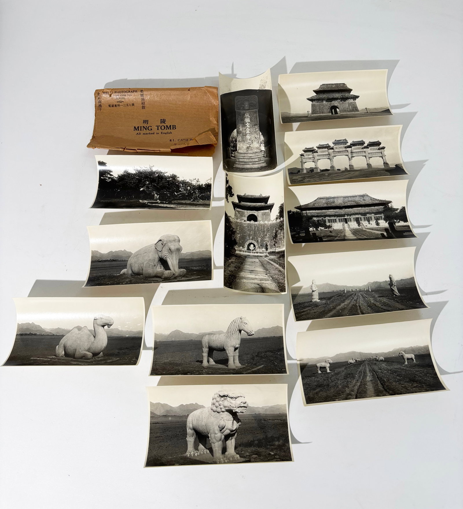 12 Vintage Mei Li, GSP Photos; Ming Tombs. Beijing: 12 Vintage Mei Li gelatin silver print Photographs of the Ming Tombs near Beijing with 5 marble gate, the tower, entrance building, sacrificial hall, ancient pine tree, large animals on spirit road; e