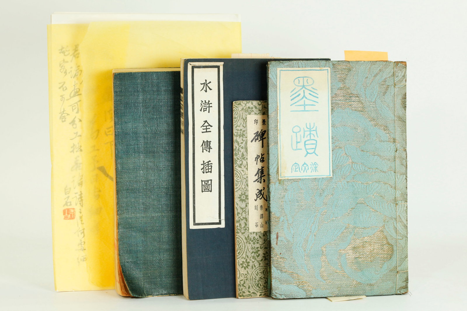 8 Chinese Art Prints & 4 Rare Books: 8 Chinese Rong Bao Zhai Art Prints including 4 after Qi Baishi from a 1951 edition with 4 others each on folded double pages now disbound with binding holes; together with 4 Books: a woodblock printed