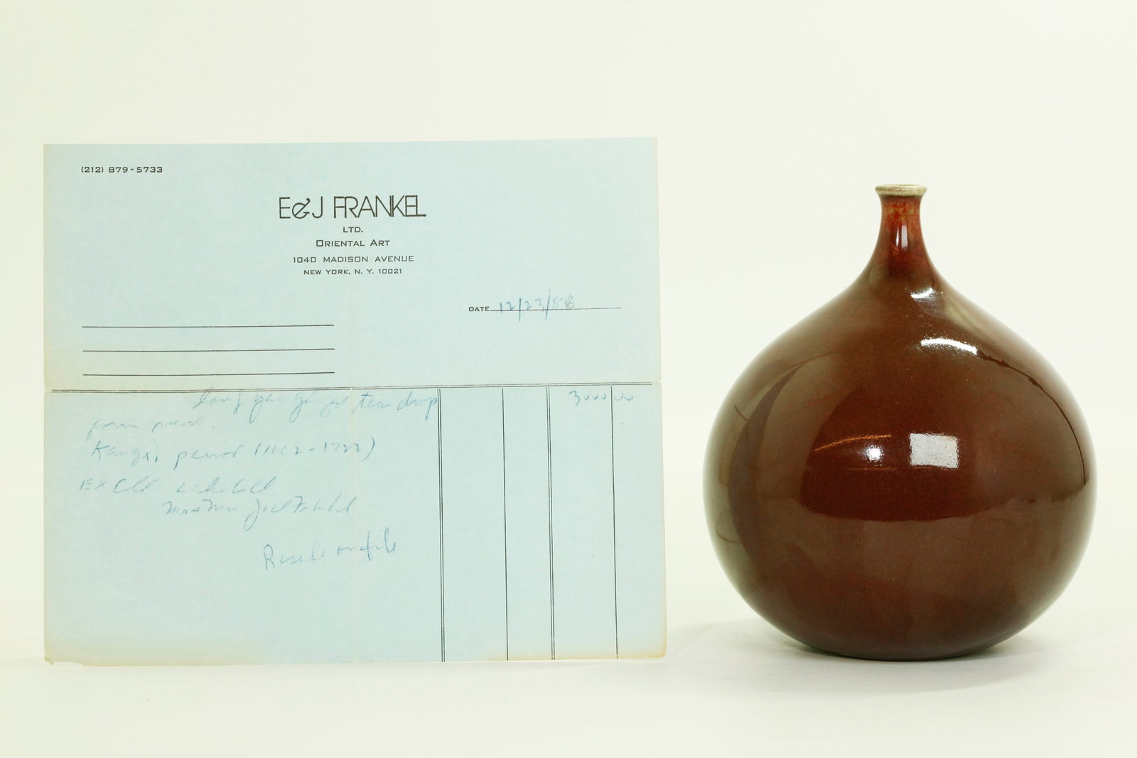 Chinese Underglaze Red Porcelain Bud Vase: Chinese Underglaze Red Porcelain Bud Vase, the red thinning at the small rolled mouth to a white and bright red with pale green and ending at unglazed recessed base in a clean roll; the bulbous body i