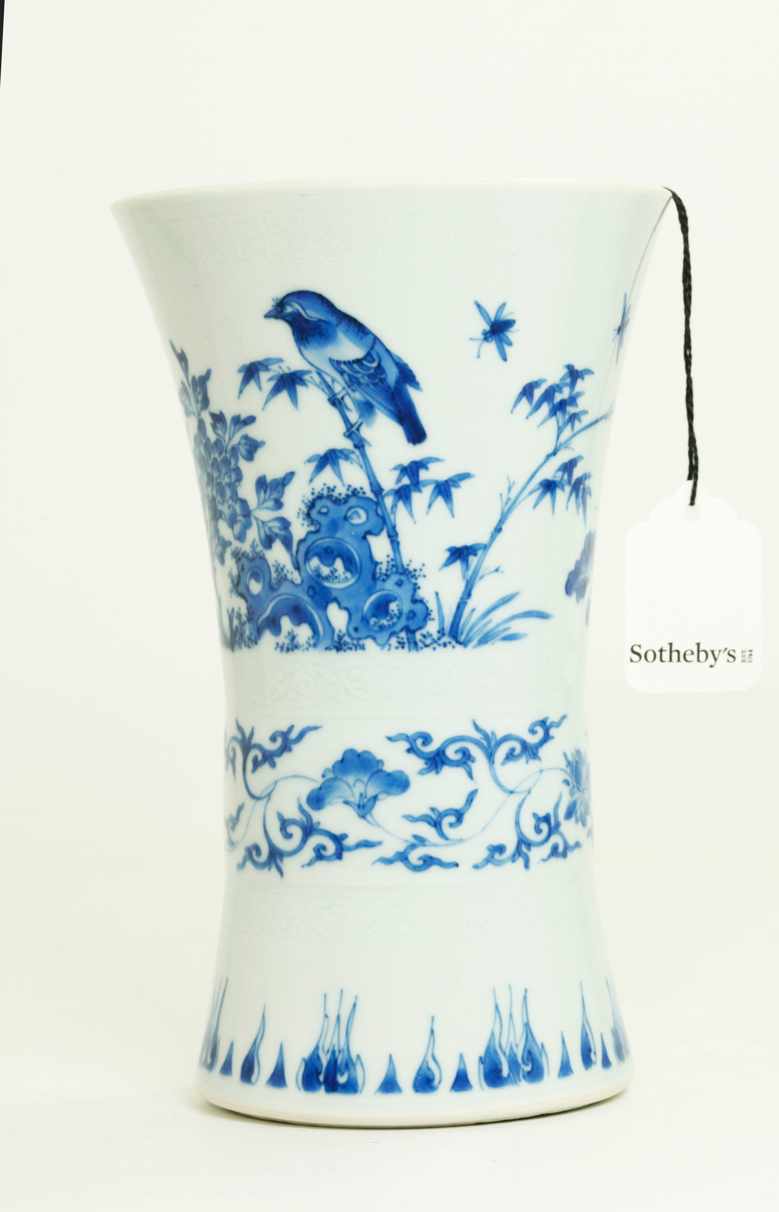 Sotheby's Chinese Ming Chongzhen Porcelain Vase: Chinese Chongzhen, Ming Dynasty Blue & White Porcelain Beaker Vase, the flared base with rising leaves, the center with scrolling flowers between 2 "Anhua" incised bands under the glaze and the flared