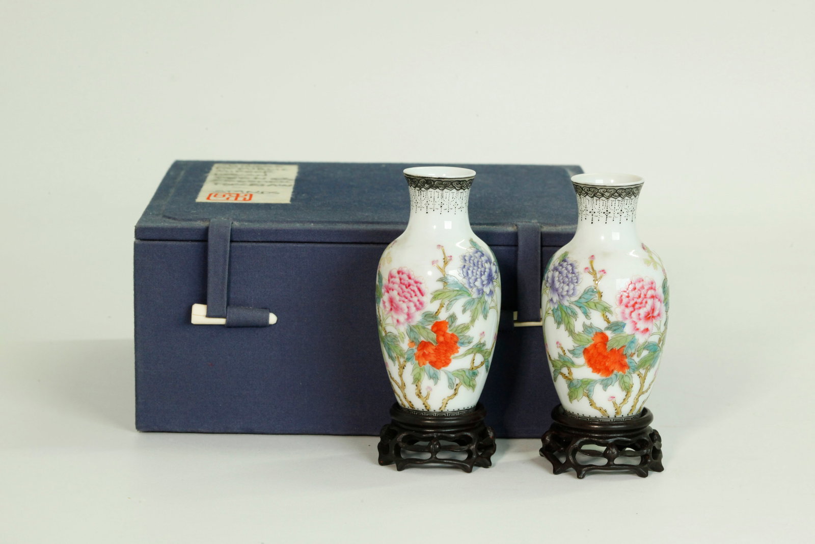 Rare Pr Chinese Republic Porcelain Mini Vases: Rare mirror Pair Chinese Republic eggshell Porcelain Miniature Vases painted with an opposing design of 4 colored Peonies on stems with leaves; with black jewels to neck and around foot ring; the rece