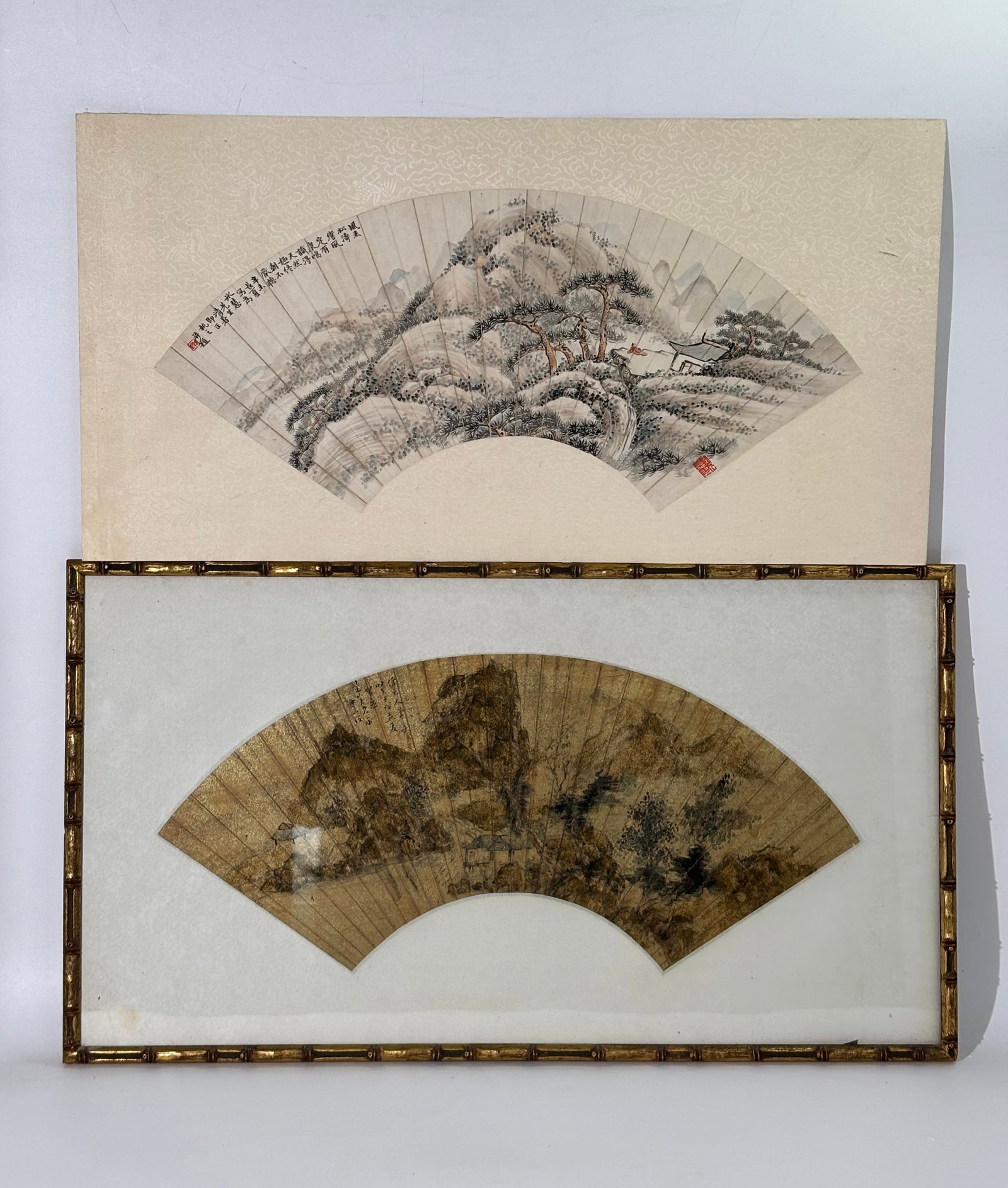 2 Chinese Qing Fan Paintings As Album Leaves: 2 Chinese Qing Dynasty Fan Paintings removed from sticks and mounted on damask covered board as Album Leaves: 1 on gold flecked paper in ink with slight color of a Scholar inside a Mountain Scenery Vi