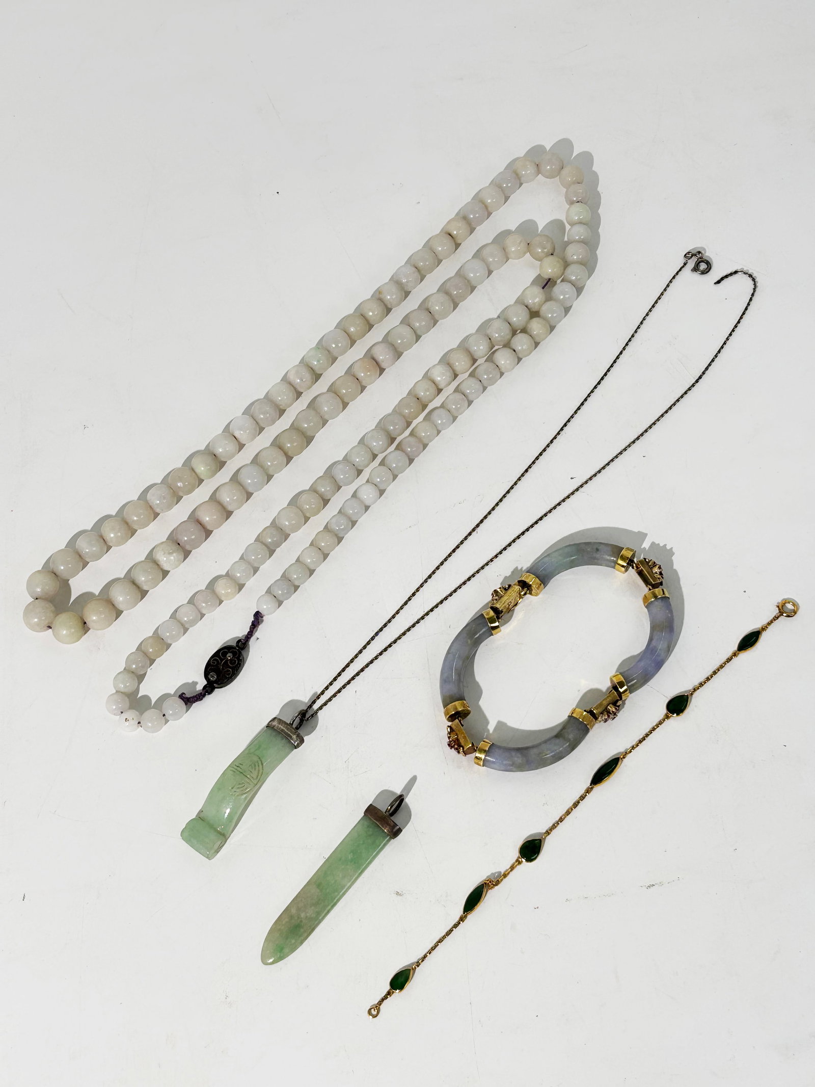5 Pc Chinese Jadeite & 14K Gold Silver Jewelry: 5 Pc Chinese & 14K Gold Silver Jewelry: a hinged 4 part bangle bracelet in lavender jadeite with inclusions of green & russet connected with yellow gold spacers each prong-set with 6 small rubies and