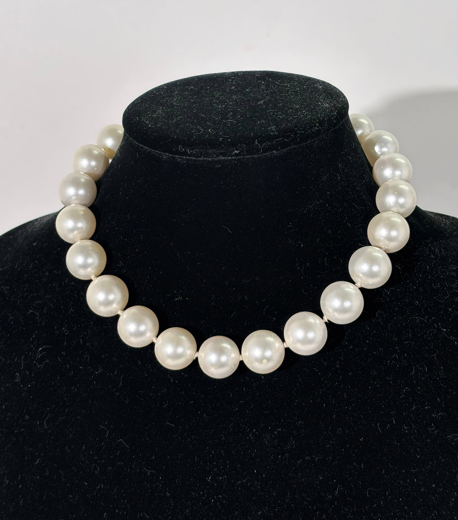 22 Large South Sea Pearl Necklace: 22 Large South Sea Pearls knotted as a Necklace with silver closure marked "925." Length 15 3/4 inches.