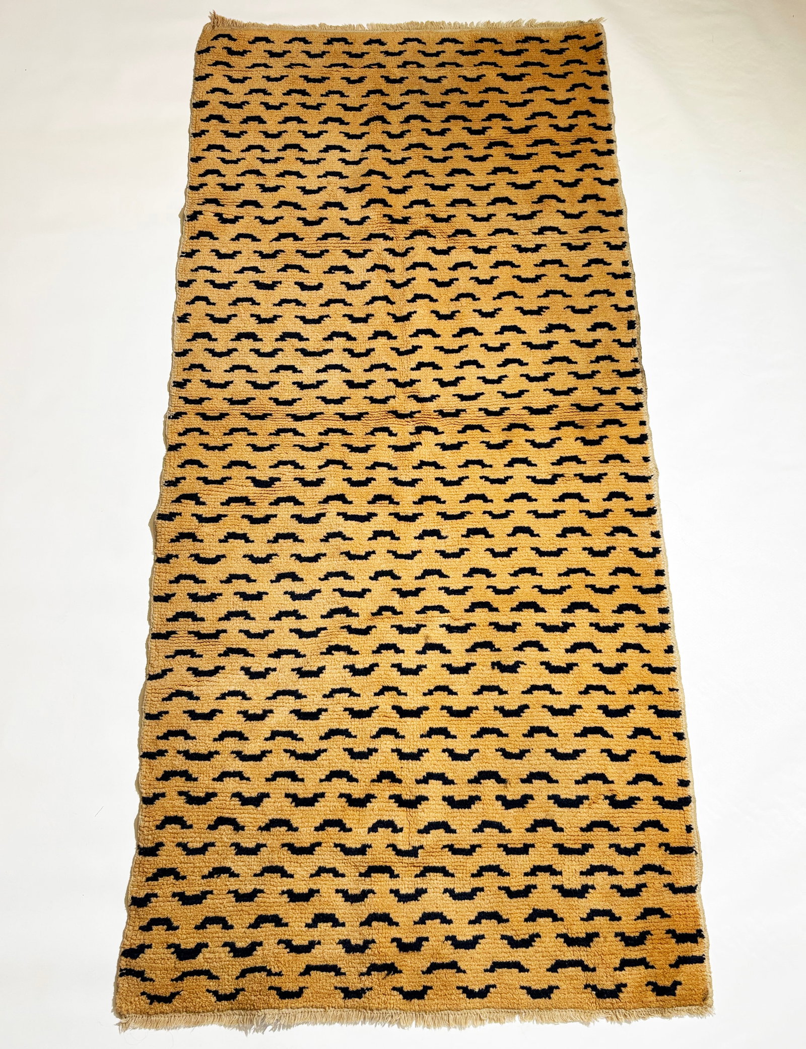 Rare Tibetan 19th C "Tiger Skin" Wool Rug: Rare Tibetan 19th Century "Tiger Skin" Wool Rug or Throne Cover with part-trimmed fringe to both short ends. Length 65 inches X width 31 inches.