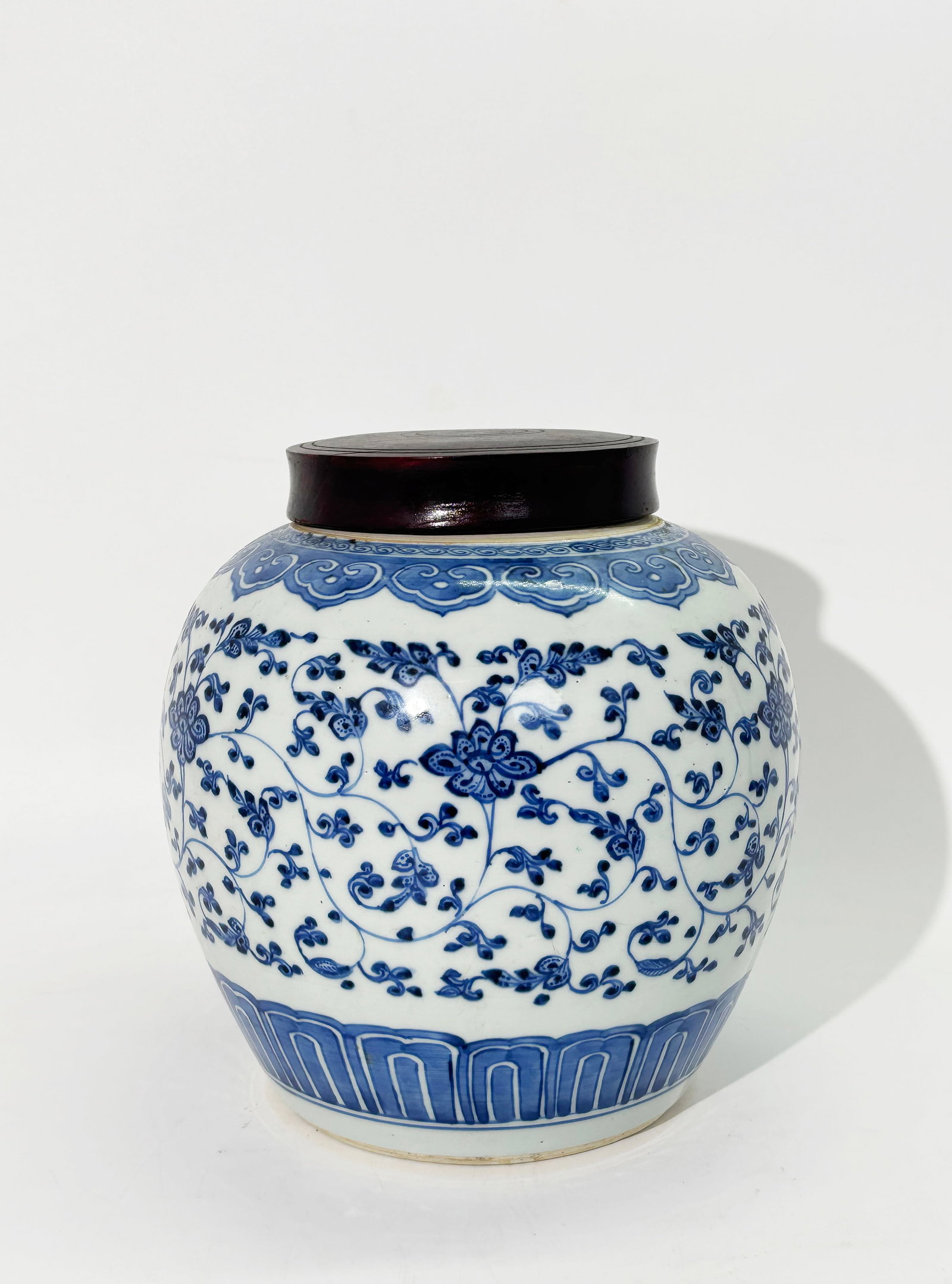 Large Chinese 18th C Blue & White Porcelain Jar: Large Chinese 18th Century Blue & White Porcelain Ginger or Tea Jar with a band of scrolling stems, leaves and flowers in the Ming style with "heaped & piled" effect between a lappet border at bottom 