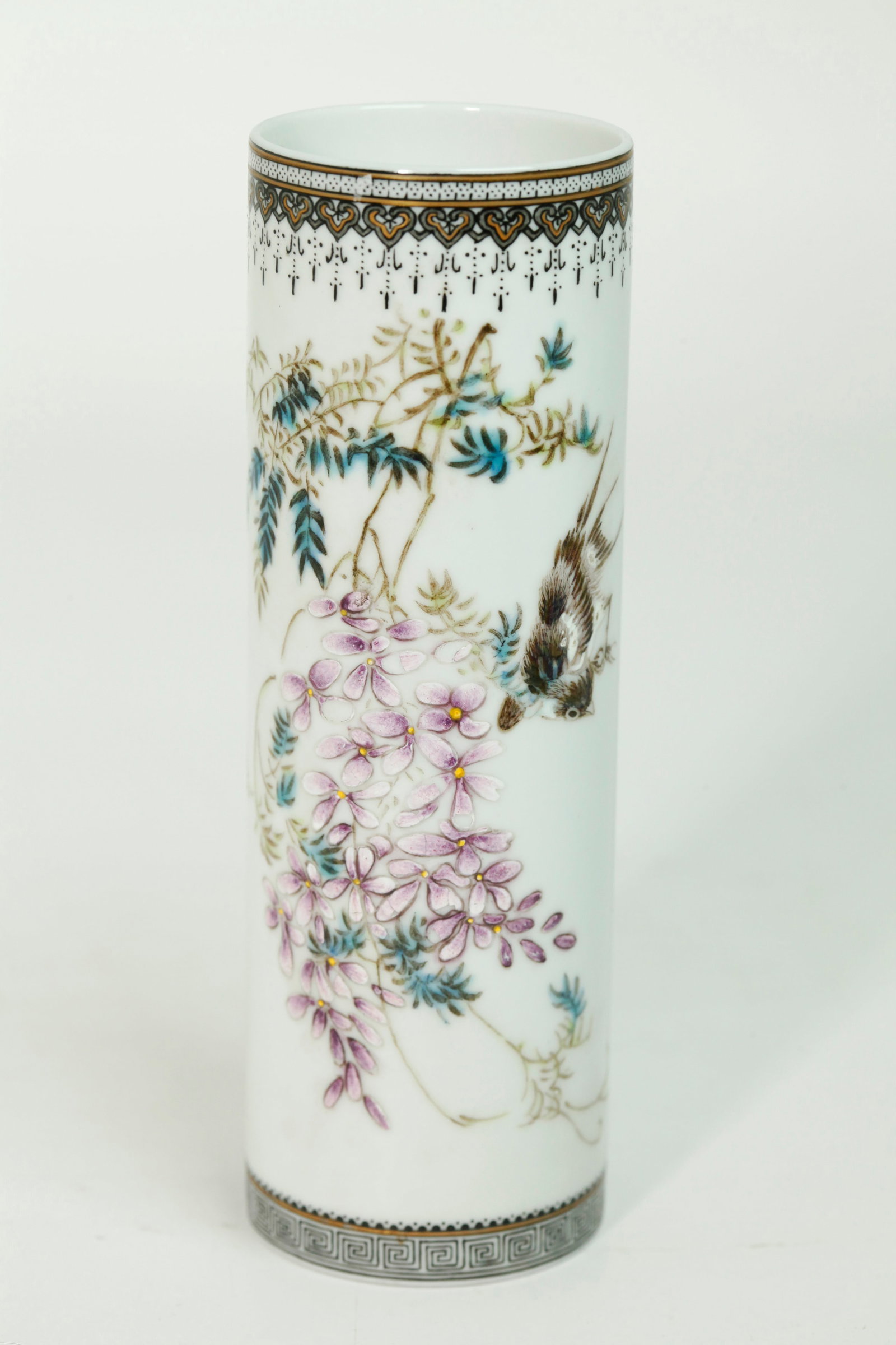 Fine Chinese Artist Enameled Porcelain Brush Pot: Fine Chinese Artist Enameled near-eggshell Porcelain tubular Brush Pot with a magpie bird and blossoming wisteria vine with a calligraphy inscription and 1 red seal to side between ribbon borders in b