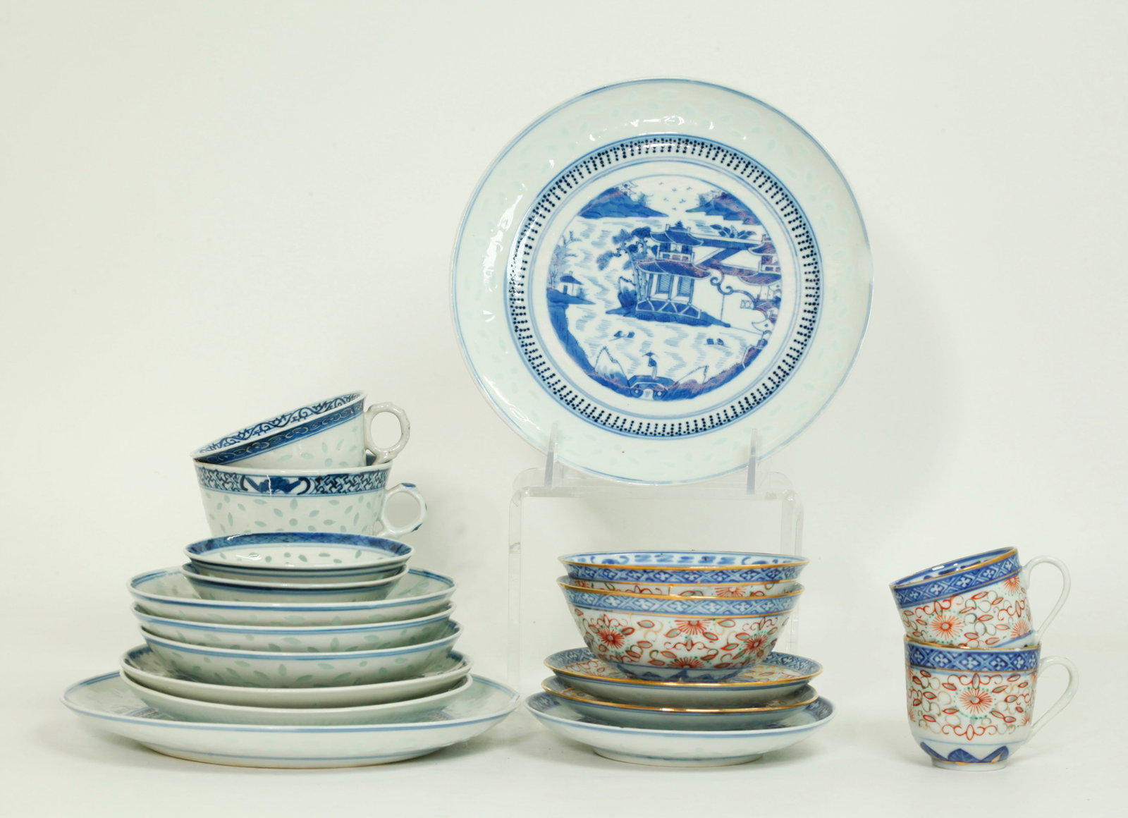 18 Chinese Blue White Porcelain Rice Inlay Pieces: 18 Chinese Blue & White Porcelain Rice Inlay Pieces with borders of translucent glaze filled borders between ribbon designs in underglaze blue with 9 plates with centers of Island Pavilions and Figure