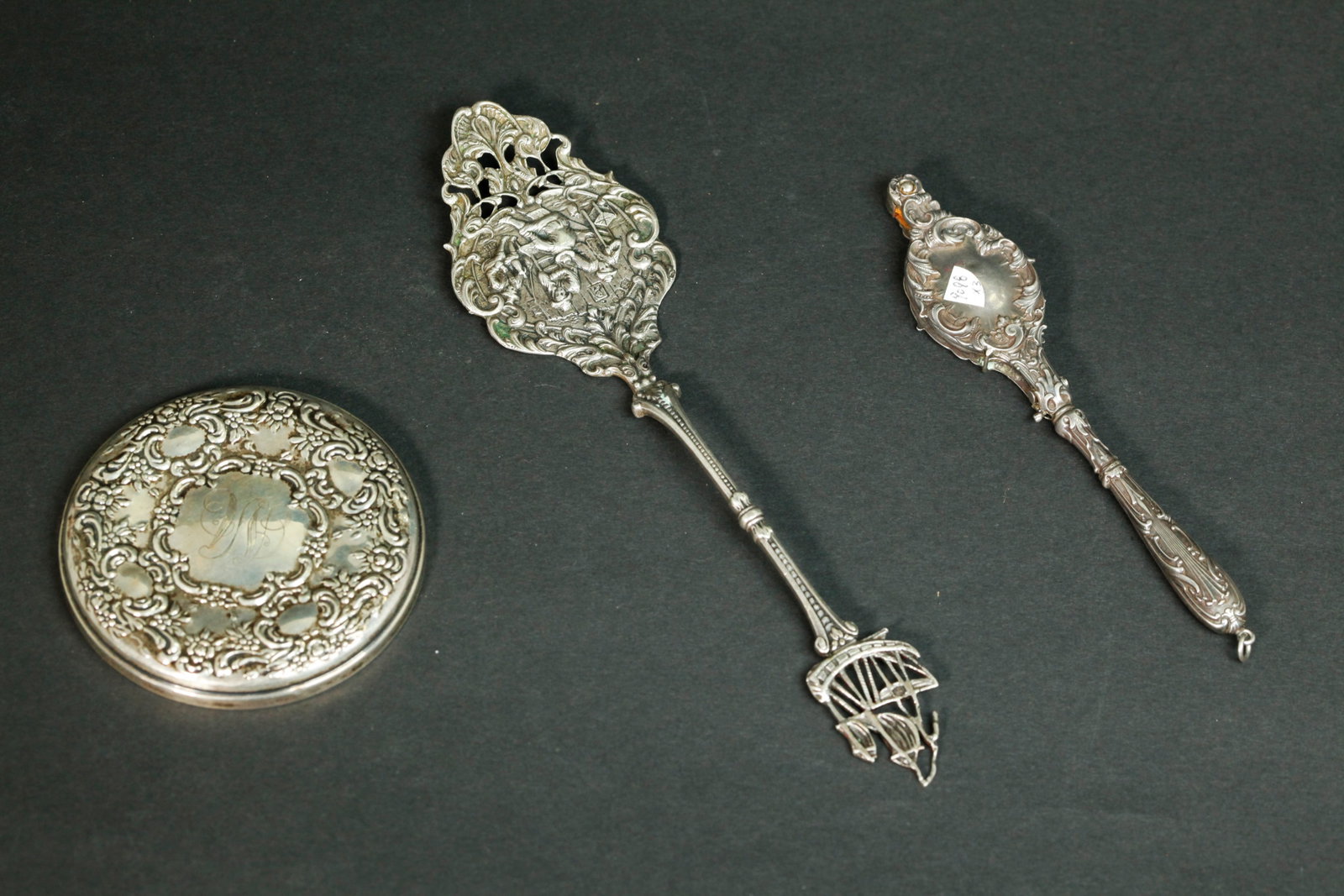 3 Sterling Silver Pieces 143.5 Grams: 3 Sterling Silver Pieces 143.5 Grams; a spring-loaded lorgnette marked "Sterling", a round mirror marked Towle Sterling, and a Dutch Silver Cake Server. Length of Dutch Server 7 3/4 inches