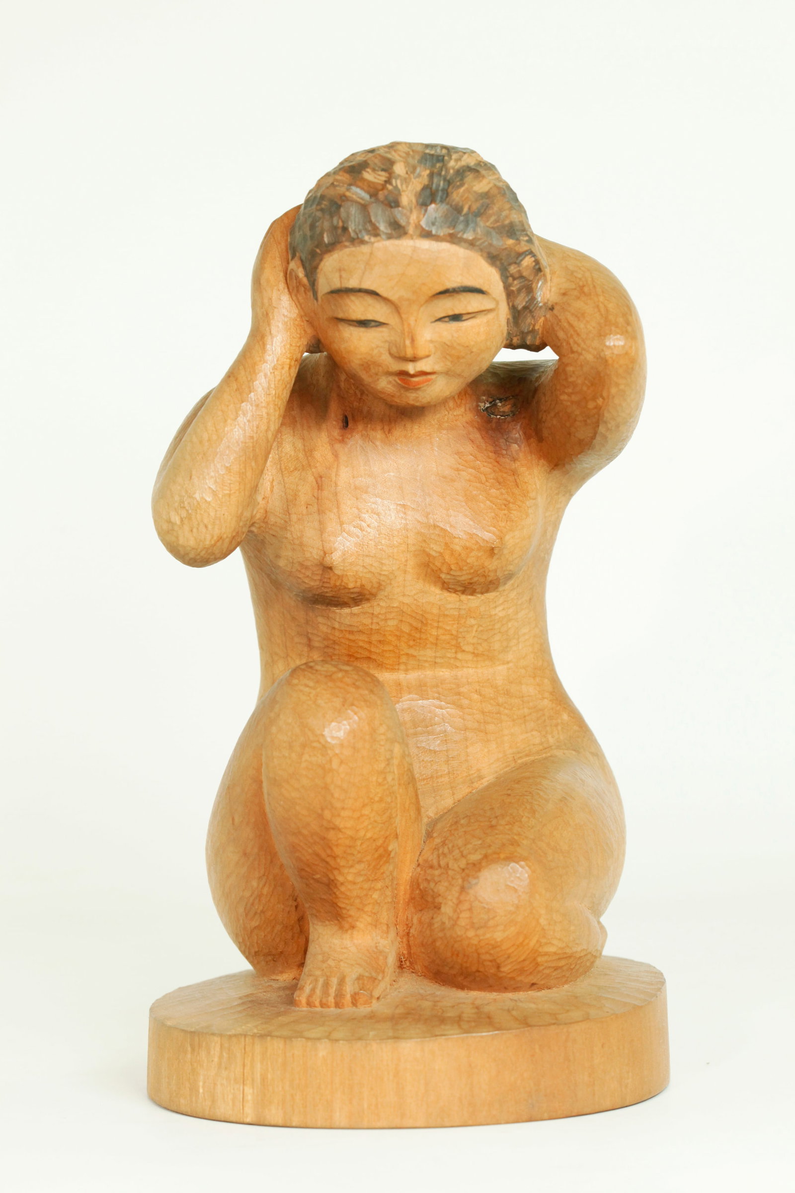 Japanese Mingei Modernist Wood Nude Sculpture: Japanese Mid Century Modernist Mingei Movement solid Wood Female Nude, Crouching Bather with touches of color to the head, carved with integral base incised to flat bottom with mark "Yamae Shojiro Sak
