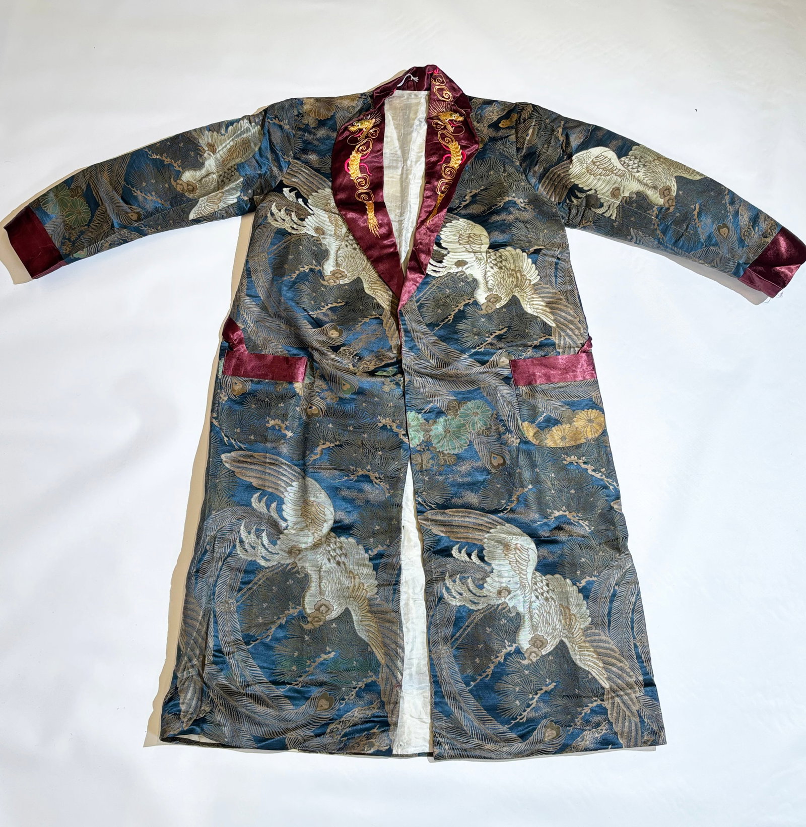 Japanese White Gold & Silk Brocade Phoenix Robe: Japanese White Gold & Silk Brocade Phoenix Robe, cut in western style with patch pockets and a scroll collar embroidered with Gold Thread Dragons on a brown silk and a brown silk tie sash; lined with 