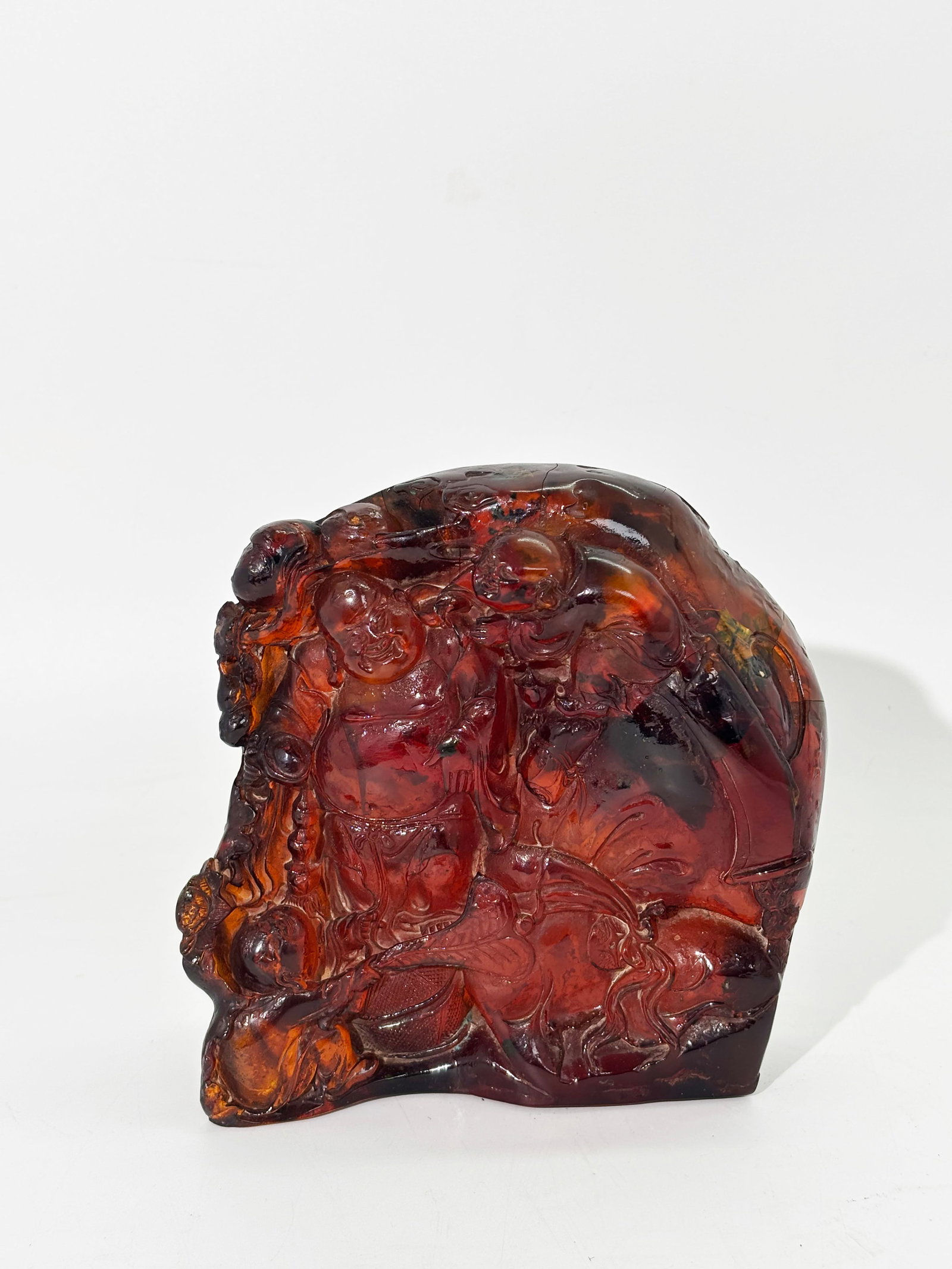 Large Amber Budai Buddha & Boys; 1,140G: Large Amber Budai Buddha & Boys. Total weight 1,140 grams. Height 6 1/8 inches X width 6 1/4 inches.