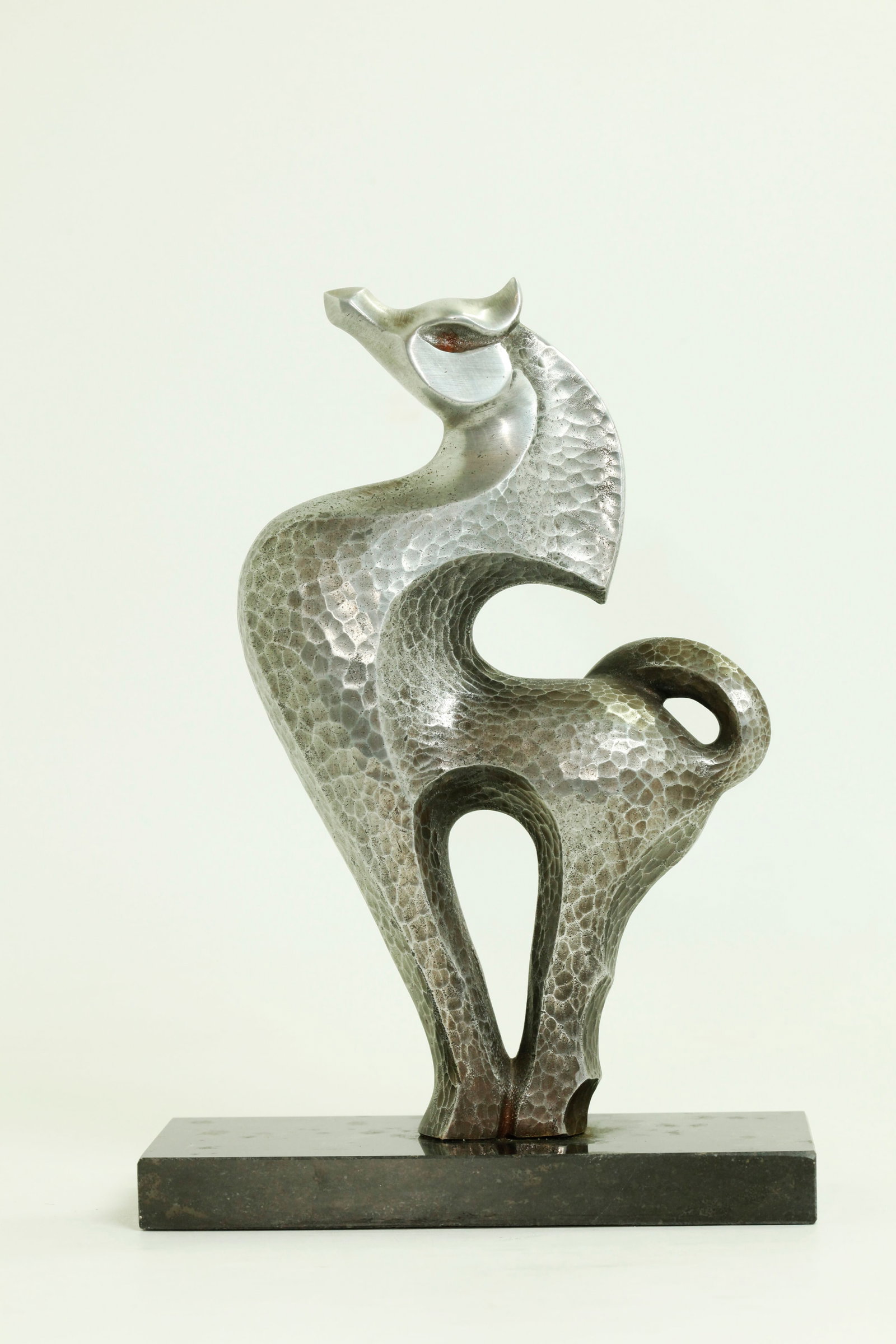 Japanese Bronze Mingei Modernist Horse Sculpture: Japanese Silvered Bronze Mid-Century Modernist Mingei Movement Horse Sculpture with small seal mark to back leg; on figured black marble rectangular stand. Height 10 inches X width of base 7 1/8 inche