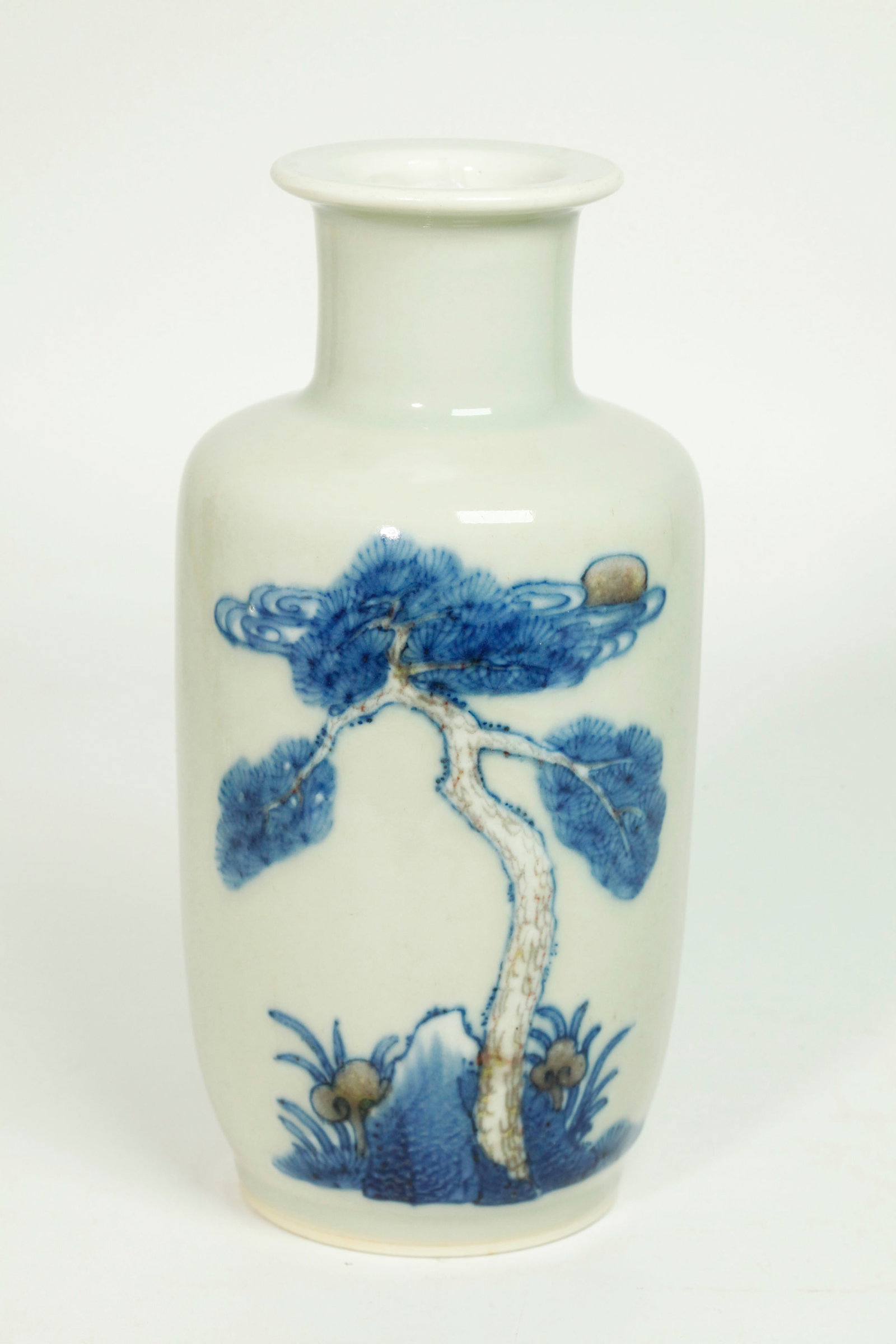 Chinese Blue Red Celadon Porcelain Small Vase: Chinese Blue & Red over white slip on a Celadon glazed Porcelain Small Vase with a "Long Life" design of Pine with Lingzhi, 2 Deer and a flying red-crested Crane, the inside of mouth and recessed base