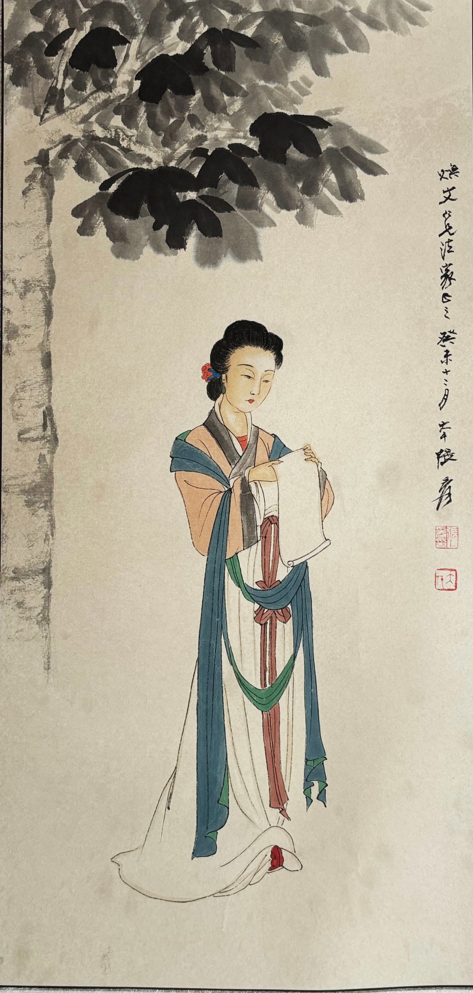 Attributed to Li Keran; Painting of Lady Reading: Attributed To Li Keran; Painting of Lady Reading with inscription and 2 red seals; ink & color on paper with fabric covered paper borders. Height of art 26 1/4 inches X width of art 12 3/4 inches. PRO