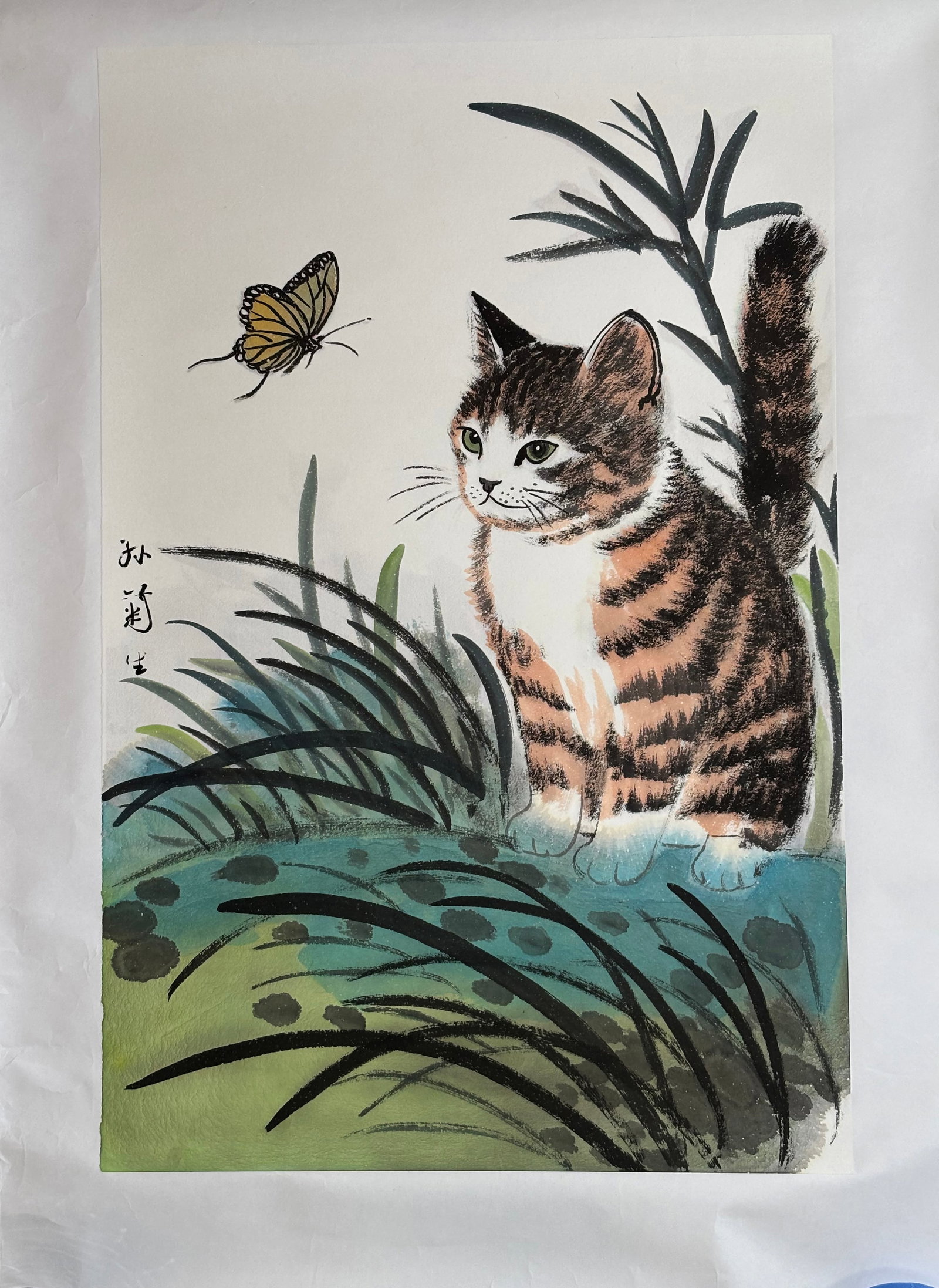 Attributed to Sun Jusheng; Kitten & Butterfly: Attributed to Sun Jusheng (1913 – 2018); Kitten & Butterfly in ink & color on paper with inscription; mounted to paper with borders. Height of art 27 5/8 inches X width 18 1/8 inches. PROVENANCE: Fr