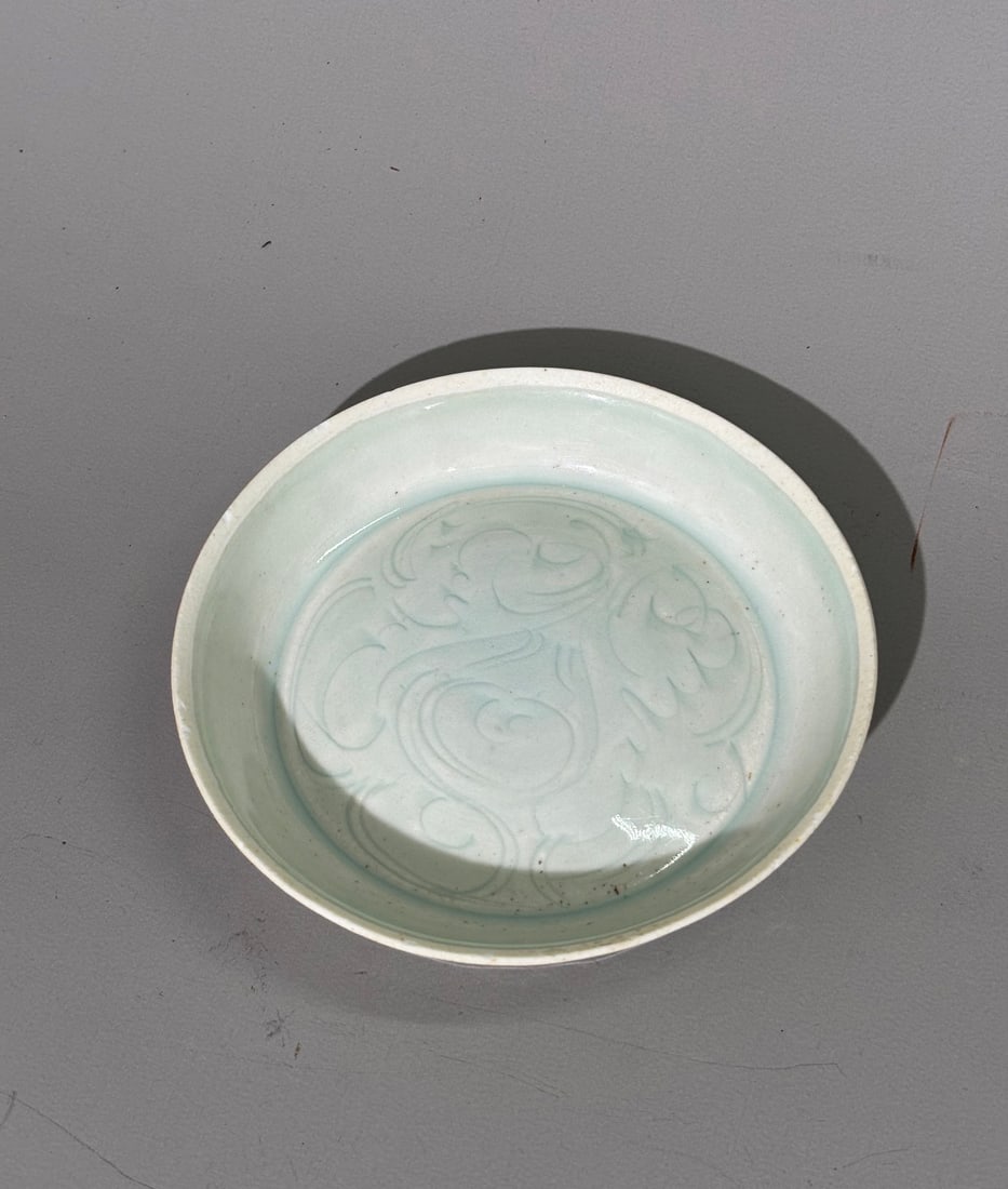 Fine Chinese S Song Qingbai Porcelain Brush Washer: Fine Chinese Southern Song pale blue Qingbai glazed Porcelain Brush Washer, the domed center well carved with scrolling vegetation, the concave base to sides fully glazed with the porcelain fired up s
